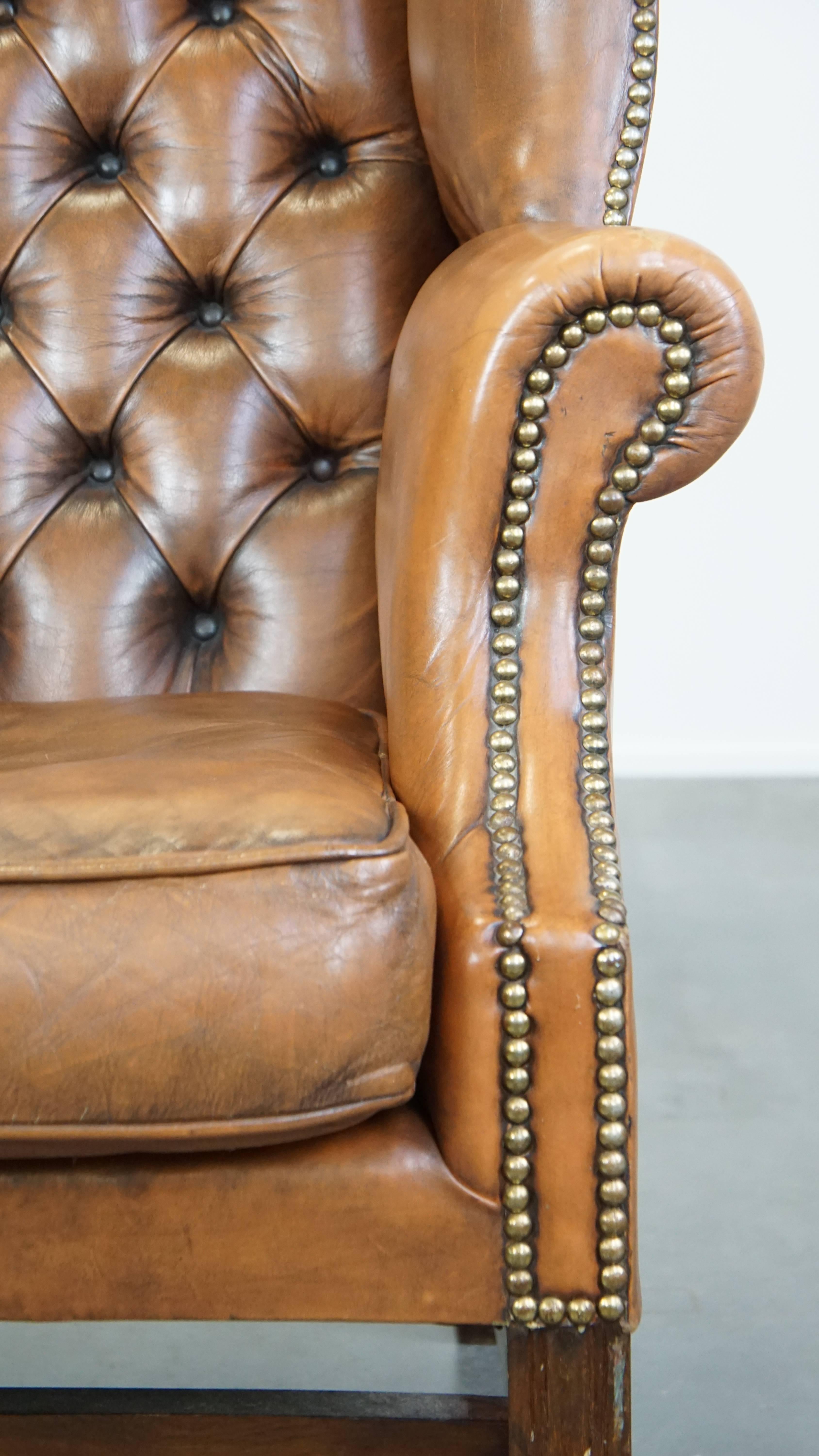 Vintage cowhide leather English Chesterfield wingback chair, light cognac color For Sale 6