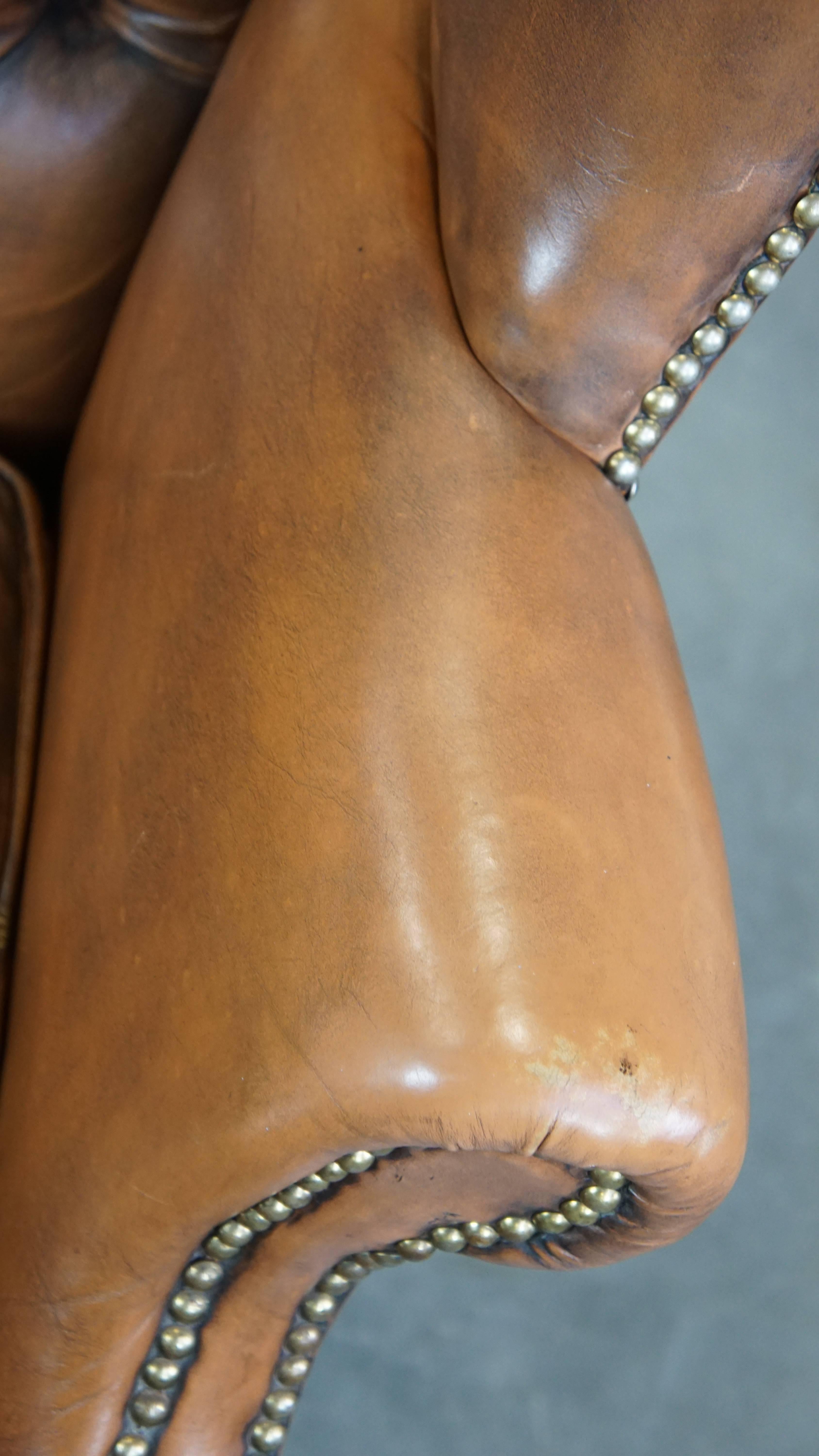 Vintage cowhide leather English Chesterfield wingback chair, light cognac color For Sale 2