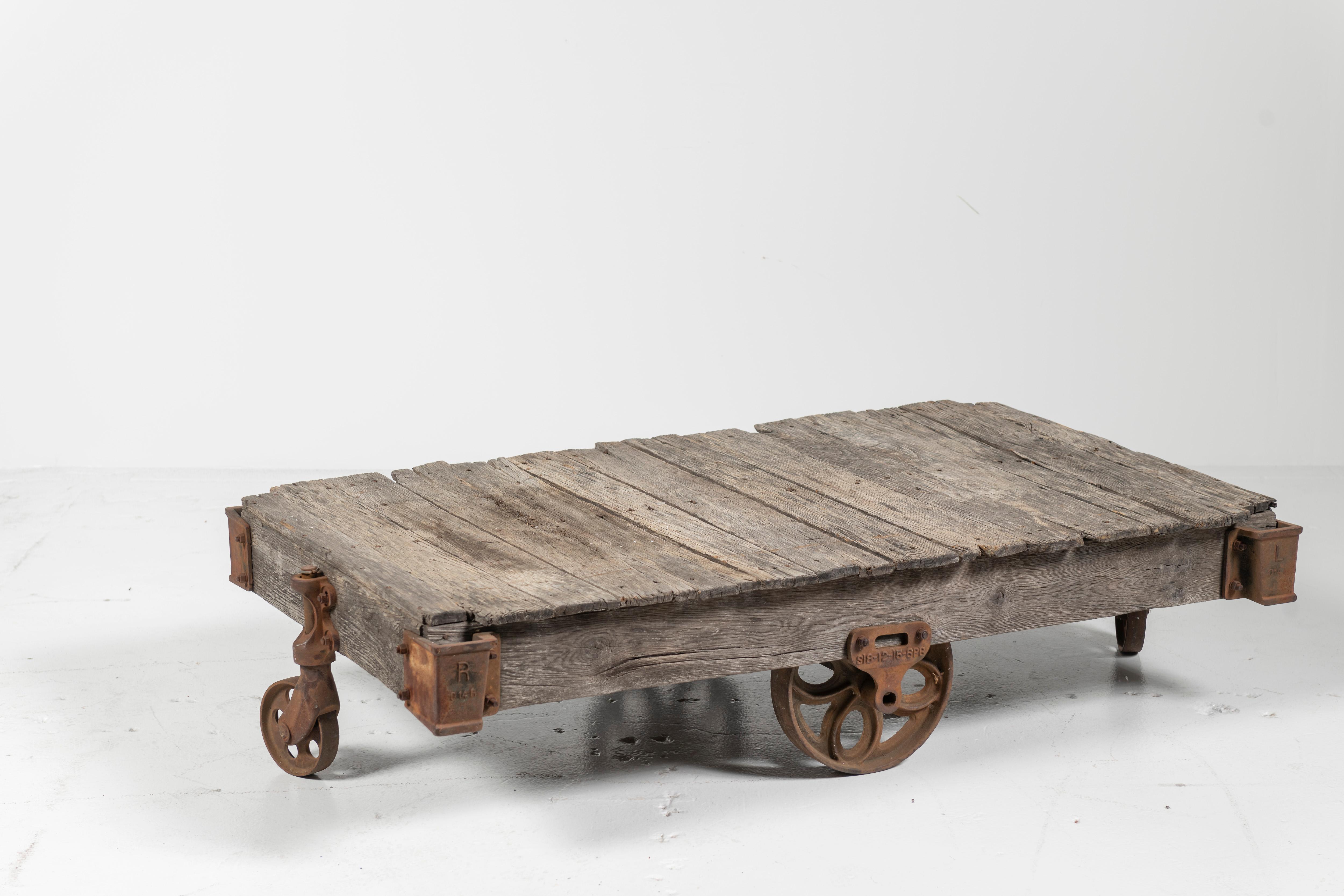 Industrial Vintage Craftsman Cart as Coffee Table, Rustic Wood on Iron Wheels, 20th Century For Sale