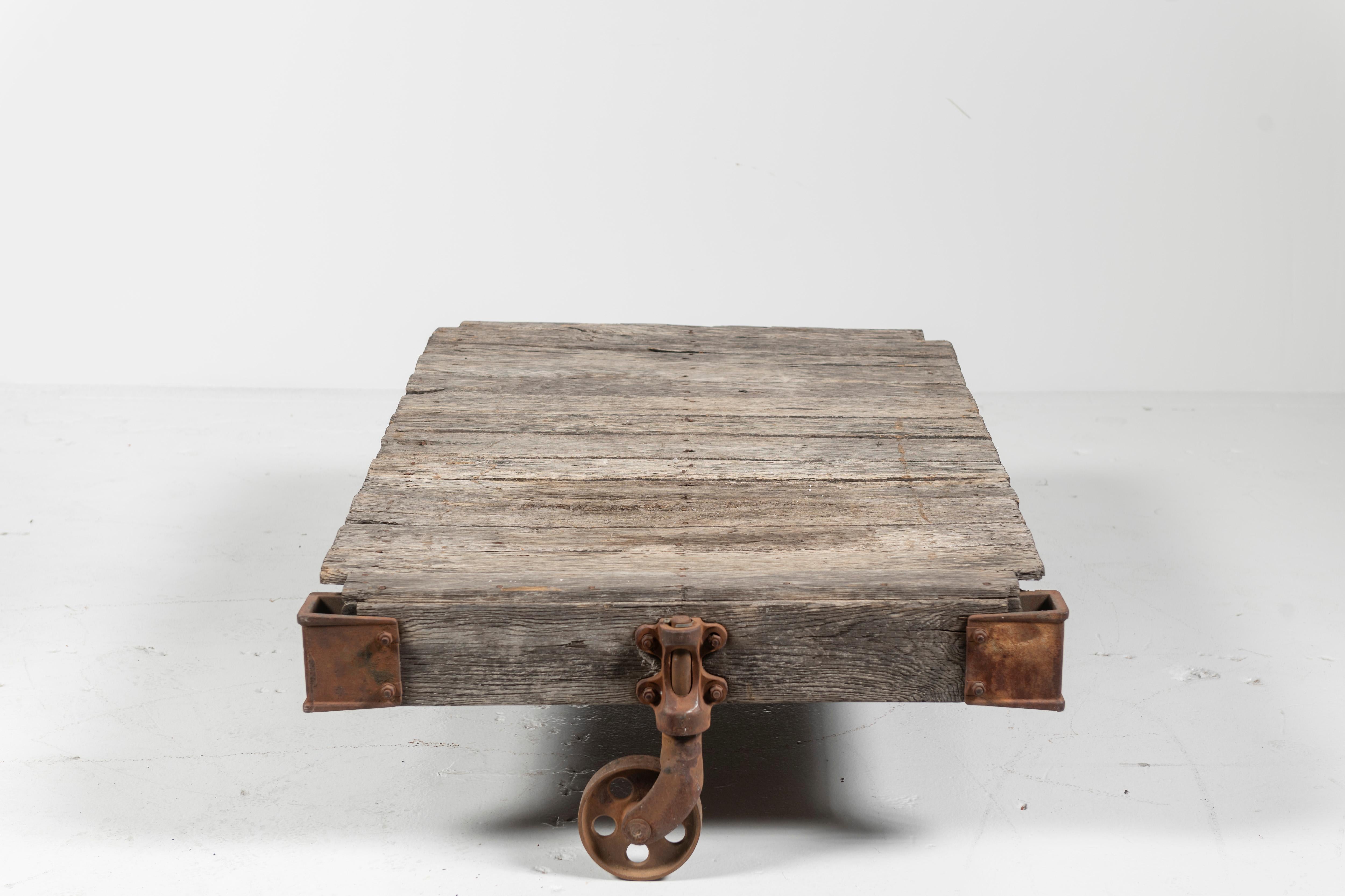 Vintage Craftsman Cart as Coffee Table, Rustic Wood on Iron Wheels, 20th Century In Fair Condition For Sale In San Francisco, CA