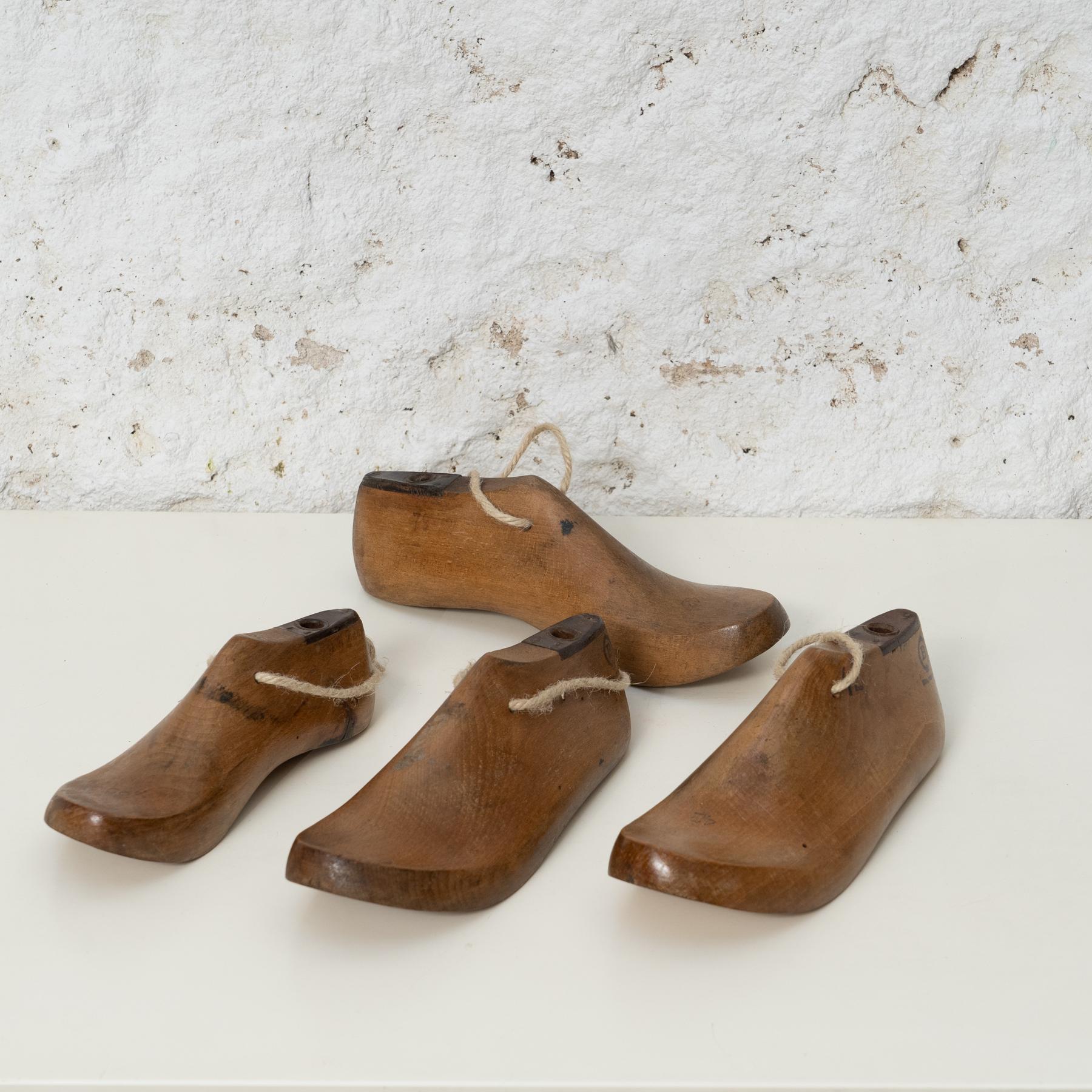     Era: circa 1940
    Material: Solid Wood

Original Condition  Vintage Charm  Timeless Craftsmanship

Discover the allure of authentic craftsmanship with this set of four solid wood shoe lasts dating back to circa 1940. Each piece tells a story