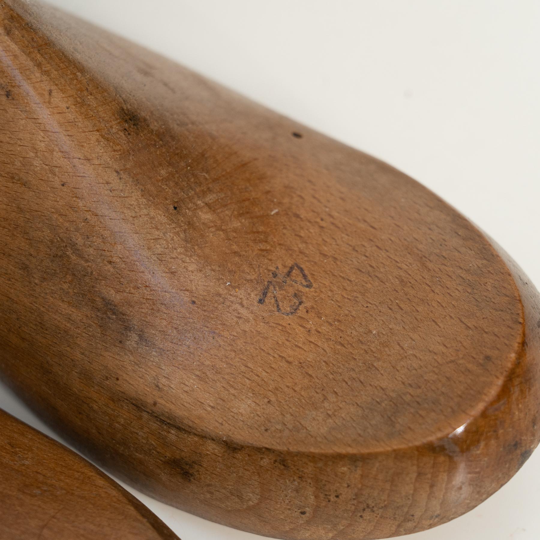 Mid-20th Century Vintage Craftsmanship: Set of Four Solid Wood Shoe Lasts, c. 1940 For Sale