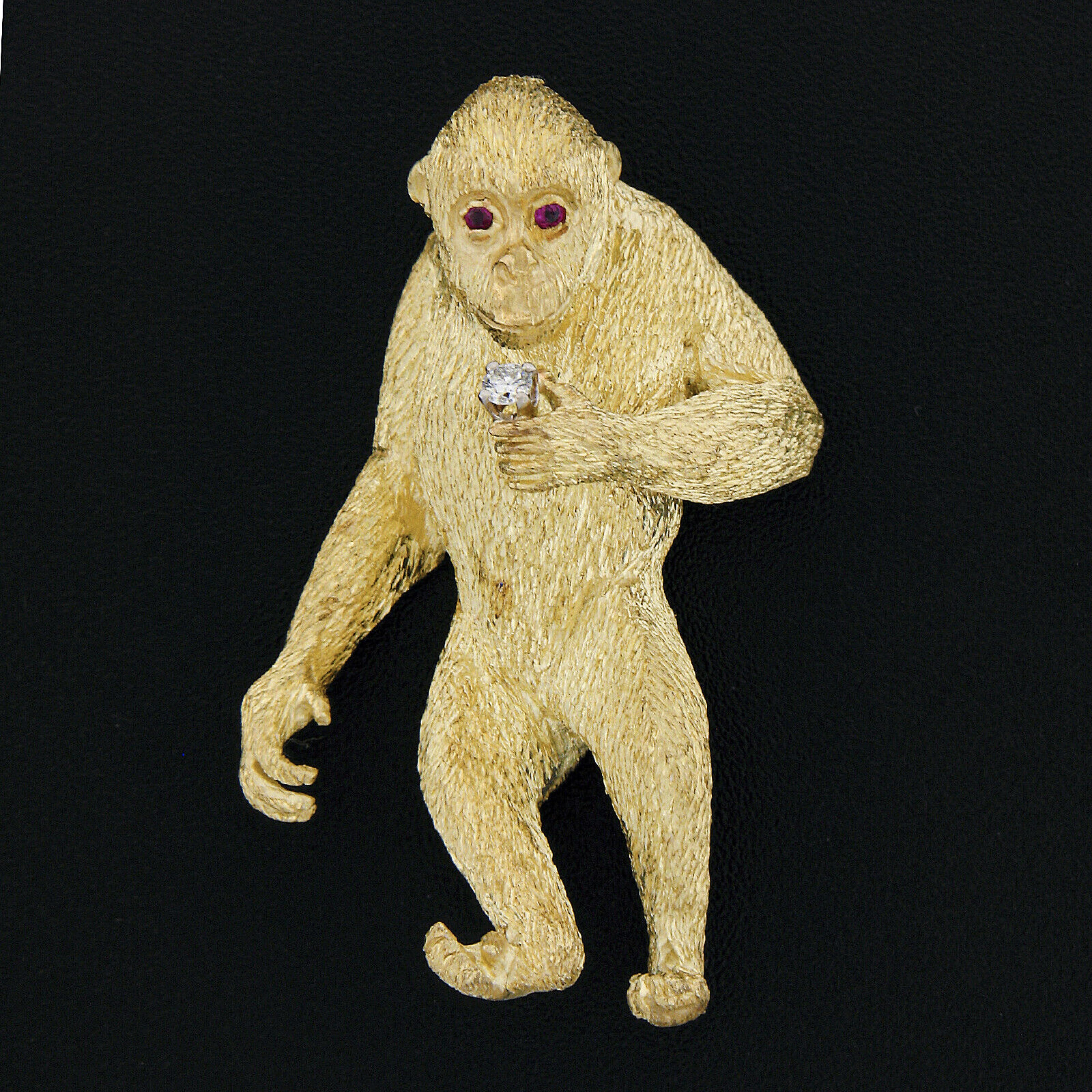 This incredible vintage brooch/pin is designed by Craig Drake and very well crafted in solid 18k yellow gold. It features a perfectly structured monkey design with unique, and remarkably outstanding workmanship and texture that bring out maximum