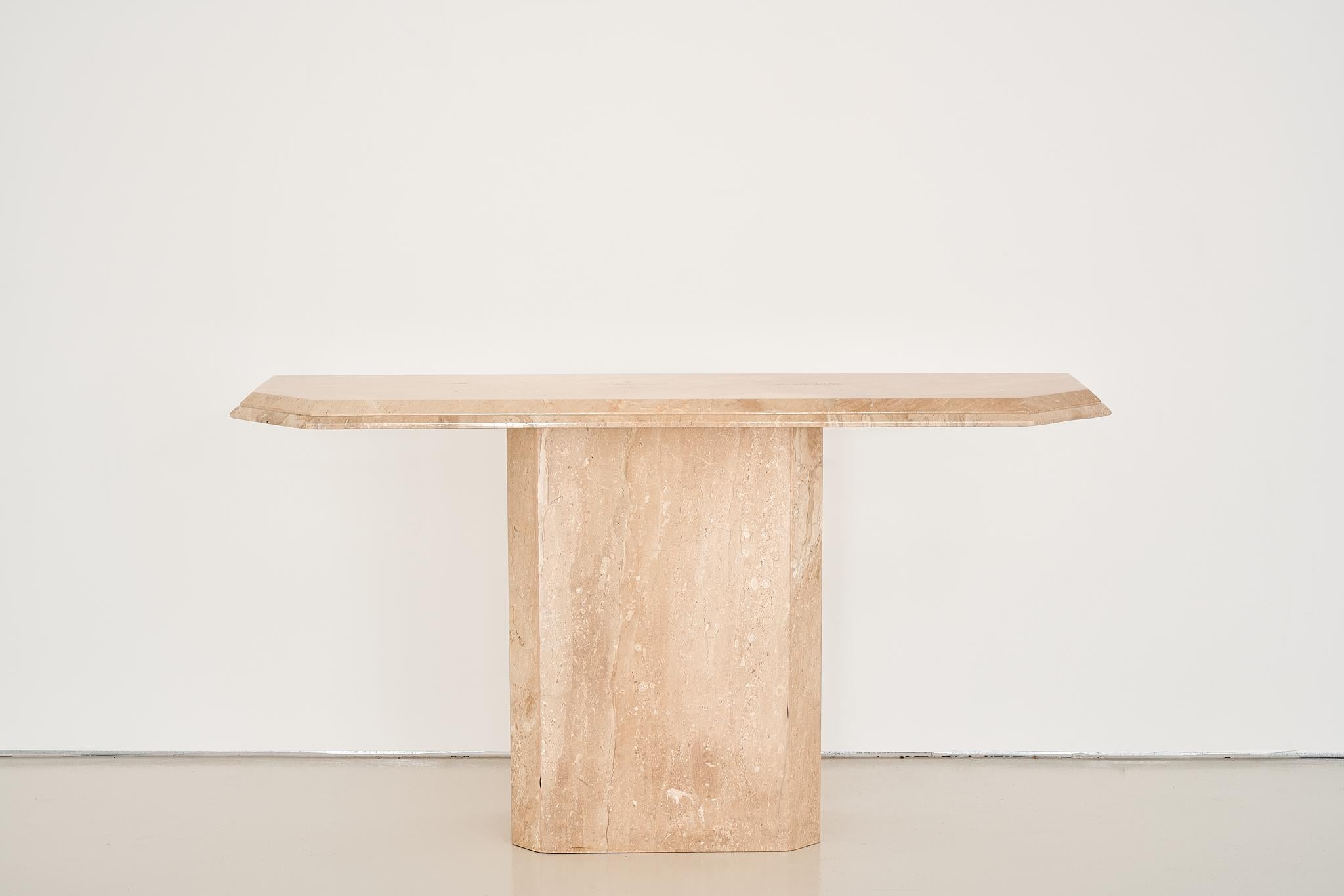 1970’s - 80’s Post Modern

Believed to be American-made when similar items were being imported from Italy.

Double chamfer table top.

Solid marble.

Sourced in Colorado.

Condition - excellent.

Measures: 55” L x 15.5” D x 30”