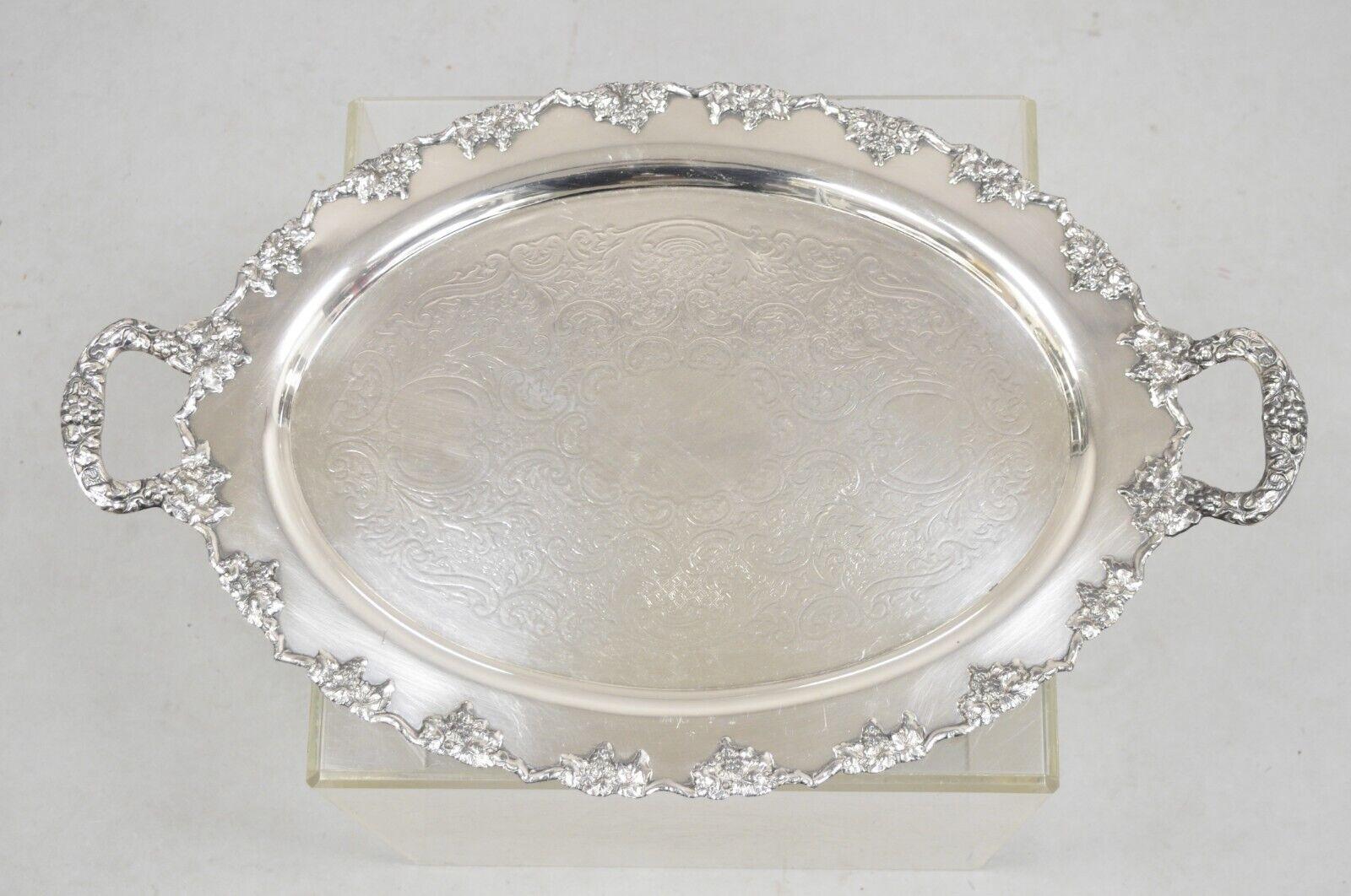 Vintage Crescent 1082 Victorian Style Silver Plated Oval Serving Platter Tray. Circa Mid 20th Century. Measurements: 1.5 