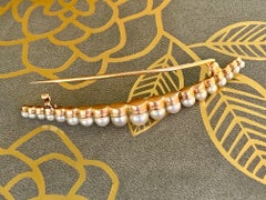 Vintage Crescent Shaped Pearl and 14 Karat Yellow Gold Brooch Pin