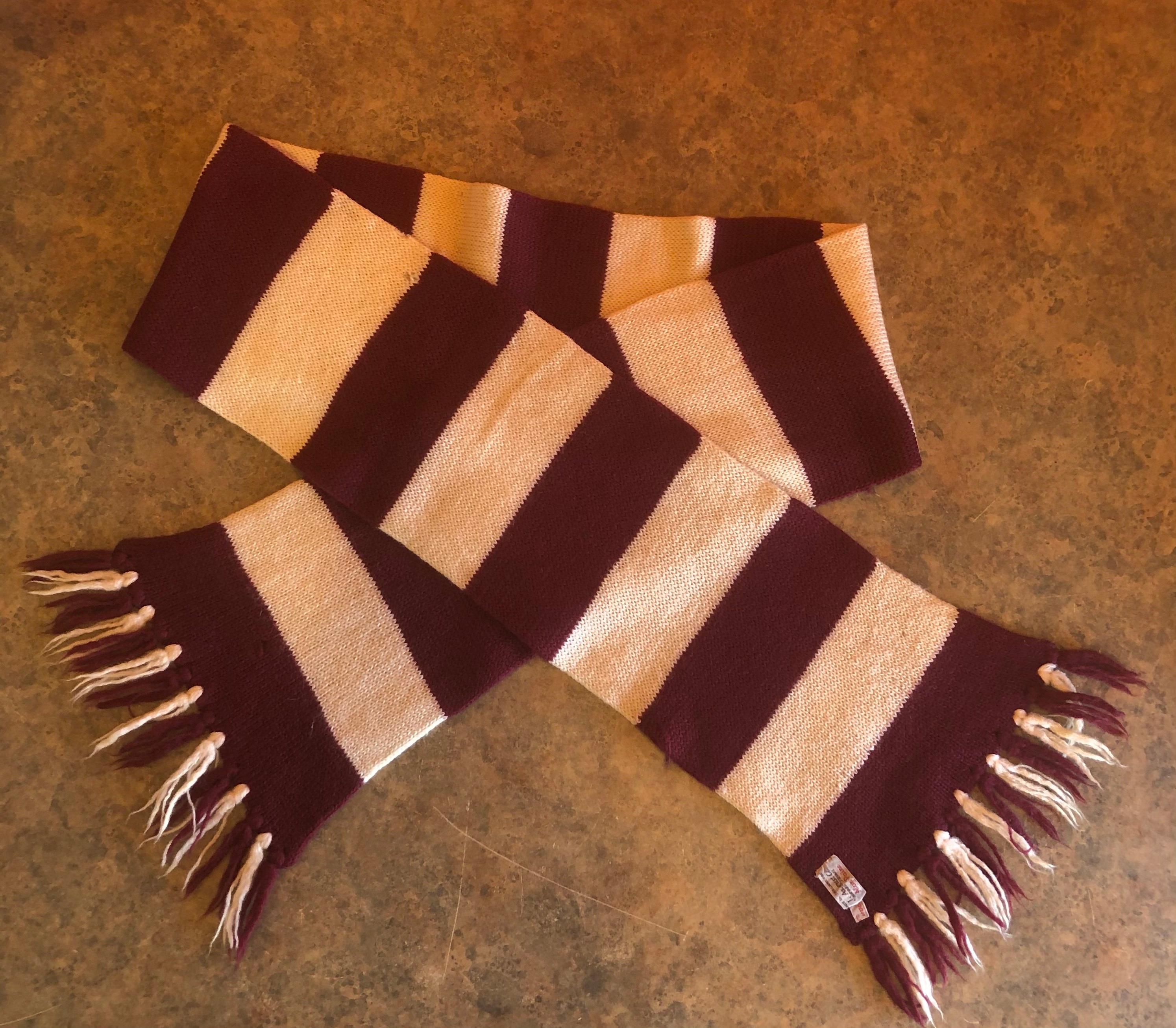 Vintage crimson and white Harvard University striped scarf / muffler by J. August Company, Harvard Square, circa 1950s. The muffler is 100% wool and was handcrafted in England. The piece is super hard to find and is in very good overall condition