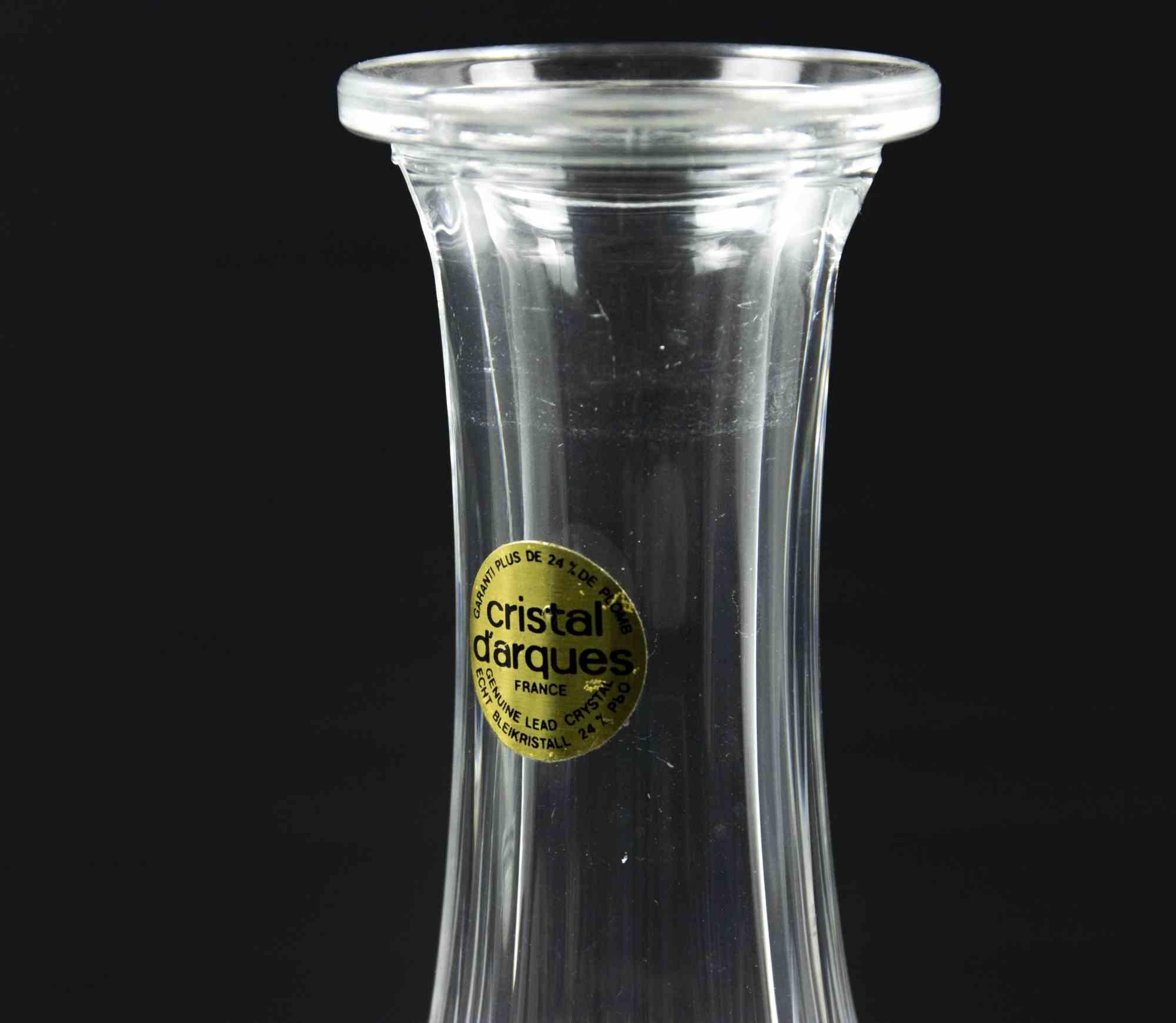 Vintage Cristal D'Arques Carafe is an original decorative object realized in the 1970s by Cristal d’Arques Paris.

 A very elegant crystal carafe perfect to give elegance to your home.

Produced by Cristal d’Arques Paris. as reported on the