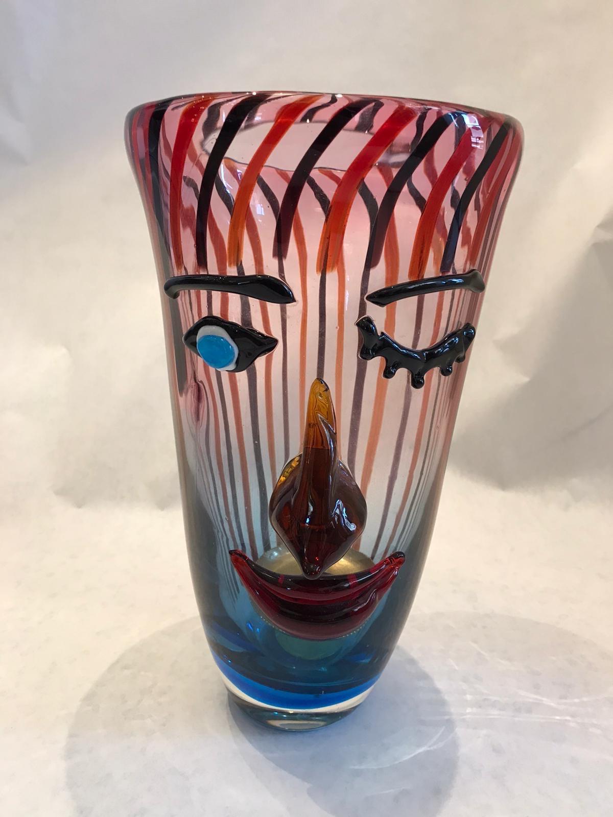 Stunning Murano abstract portrait face vase blown art glass in relief, highly decorative and splendidly designed glass vase, front depicts the face of a flirtatious young woman; Murano Cristalleria Stile D'Arte.  Wonderful unique piece to compliment