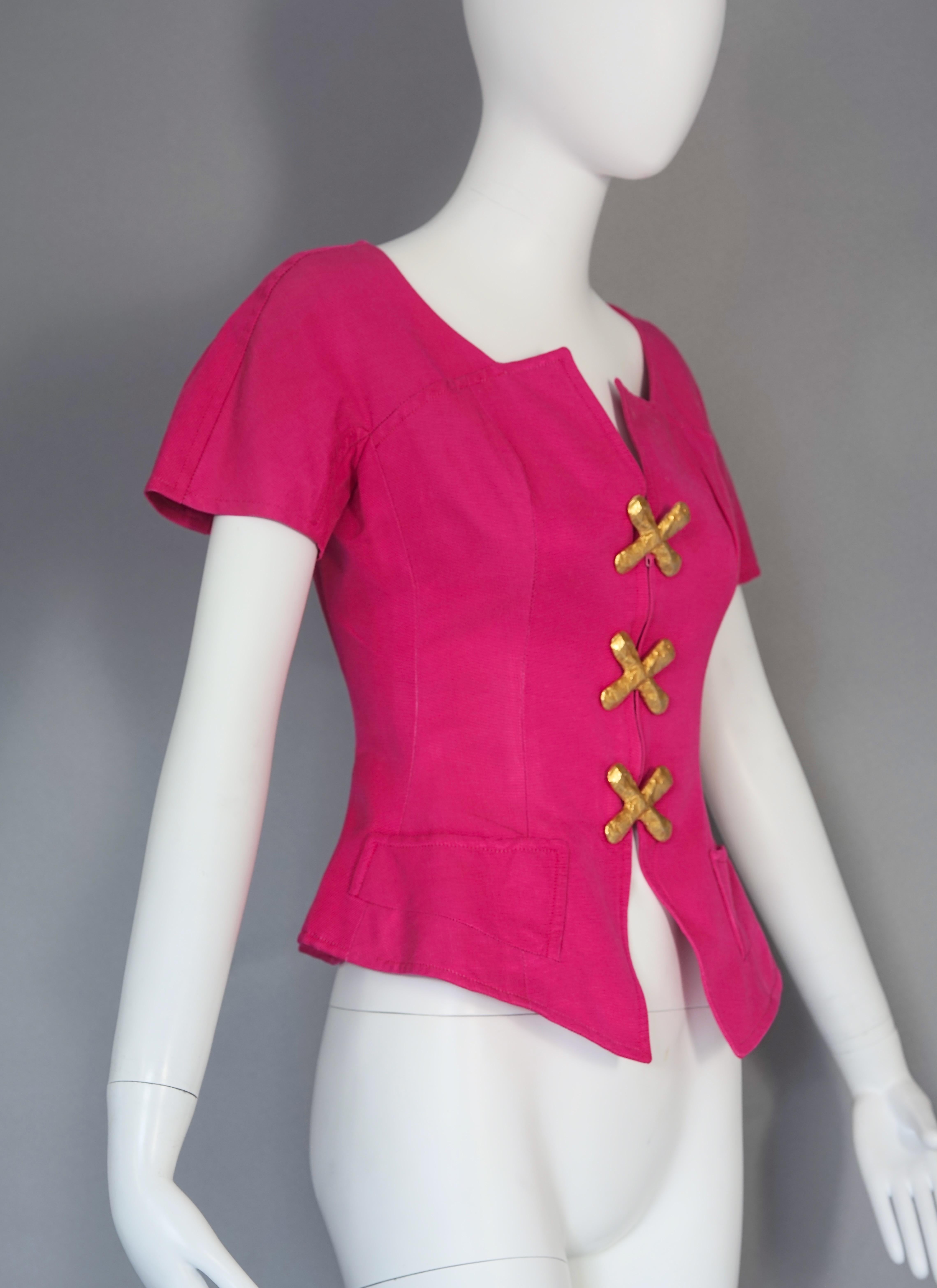 Vintage CHRISTIAN LACROIX Jewelled Buttons Fuchsia Pink Blouse Top

Measurements taken laid flat, please double bust and waist:
Shoulder and Sleeves: Raglan
Bust: 16.93 inches (43 cm)
Waist: 13.38 inches (34 cm)
Length: 23.22 inches (59