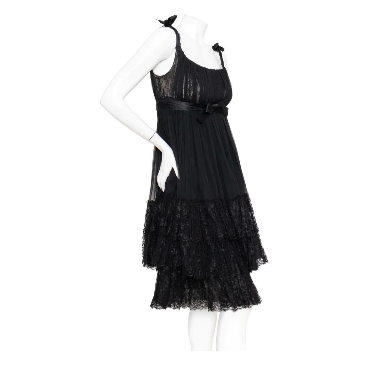 ﻿Balenciaga 1960s Black Chiffon and Lace Babydoll Dress

Description

Chiffon and Lace Babydoll Dress by Cristobal Balenciaga
1960s Haute Couture original; vintage 
Black/Nude
Spanish inspired
Thin strap; bow detail can be worn on shoulder or