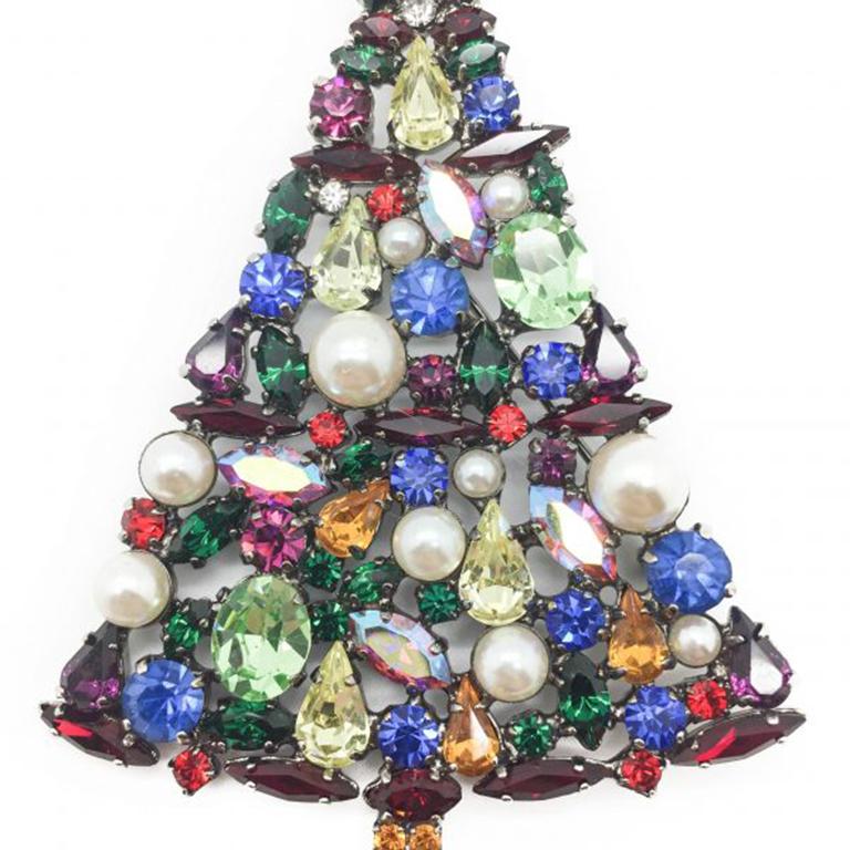 A wonderfully oversized Vintage Cristobal Christmas Tree Brooch. Christmas Tree brooches don't come much more beautiful than this. Fun and glamorous for Christmas time. Featuring wall to wall claw set fancy cut colored crystals interspersed with