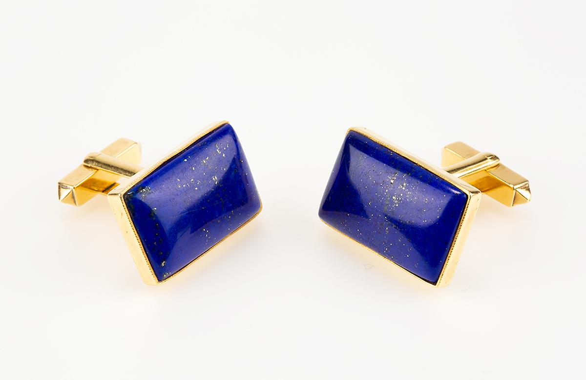 A heavy quality pair of 1970’s vintage cufflinks in 18 carat yellow gold and set with a particularly fine coloured natural lapis lazuli. Single sided with a stiff bar and torpedo connection. Signed C&F for Cropp & Farr. Hallmarked for Birmingham