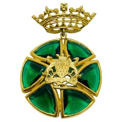 Vintage crown gold tone emerald glass dangle designer brooch