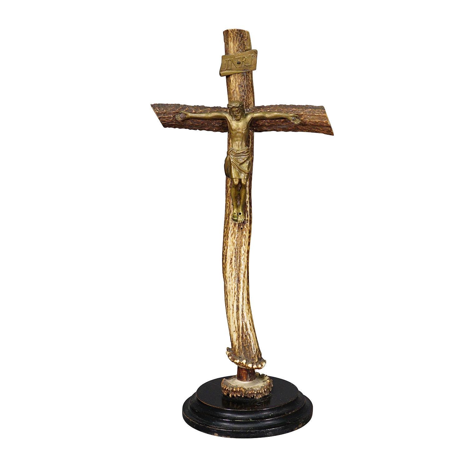 Vintage Crucifix made of Deer Antlers

A vintage crucifix with a metal sculpture of the suffering Christ on the cross. The cross is made of two deer antler pieces which are mounted on a turned wooden base.

artfour is an owner-managed trading