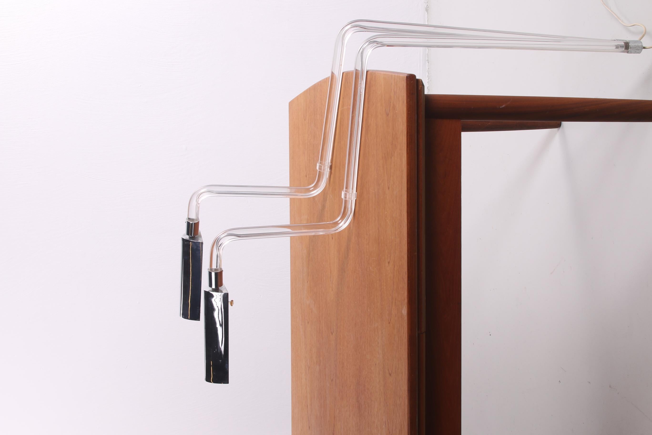 Crylicord Modernist desk lamps designed by Peter Hamburger for Knoll International, 1960.
Acrylic with adjustable chrome metal shade.
Permanent collection at The Museum of Modern Art.

Conditions: good in accordance with age and use, signs of wear