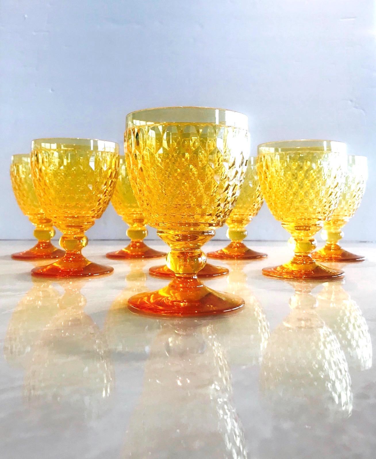 Set of eight luxury crystal claret wine glasses from Villeroy & Boch's Boston series. The stemware glasses are comprised of hobnail crystal with Classic diamond patterns and deliberate short stems. In gorgeous amber colored crystal, making them a