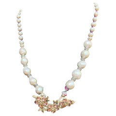 Broche vintage en cristal et argent sterling avec perles baroques proposée par LB.