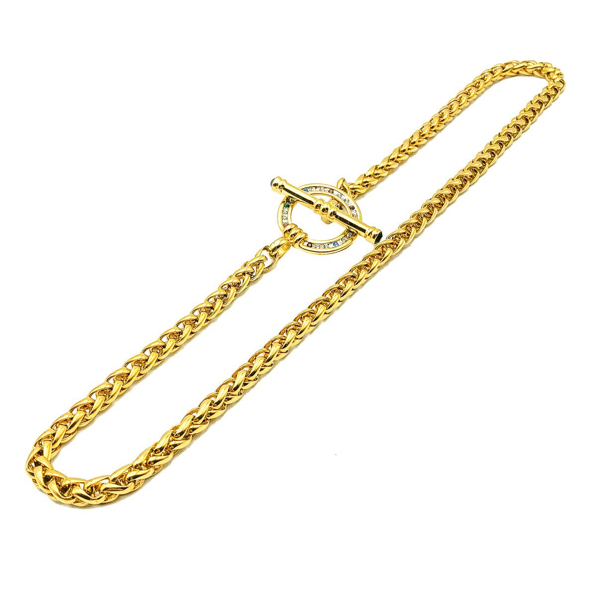 A Vintage Crystal Bar & Toggle Chain. Crafted in gold plated metal with a feature toggle fastener finished with white and coloured crystals. Substantial and wonderful quality. Very good vintage condition, 49cms. Wonderfully stylish for all