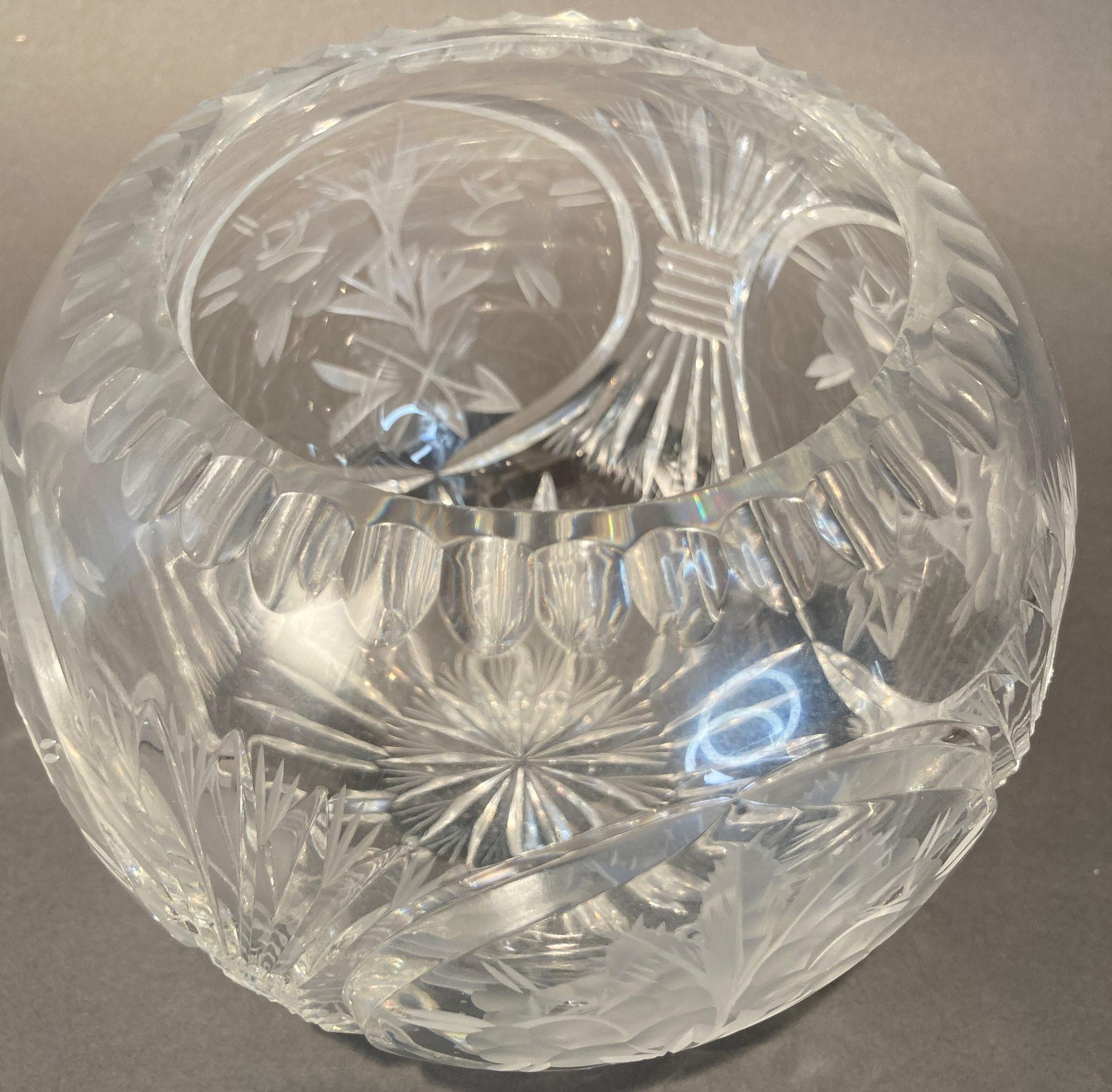 Vintage crystal rose bowl with etched Roses design.
A stunning heavy thick deep cut globe crystal flower rose bowl on a diamond and wedge cut pattern with etched roses design.
This elegant crystal quality Rose Decorative Bowl was crafted in Europe,