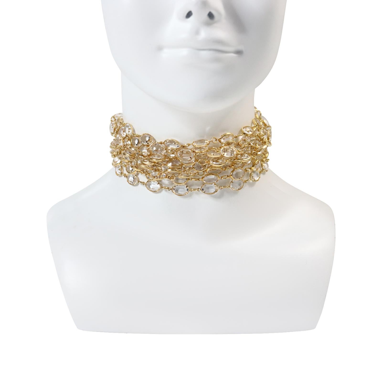Vintage Crystal Diamante Wide Choker Circa 1980s. This is one of the most gorgeous chokers I have ever come across. It is so divine.  Made up of 10 rows of oval cut open back crystal set in gold tone. The end closures have gold pieces that have pave