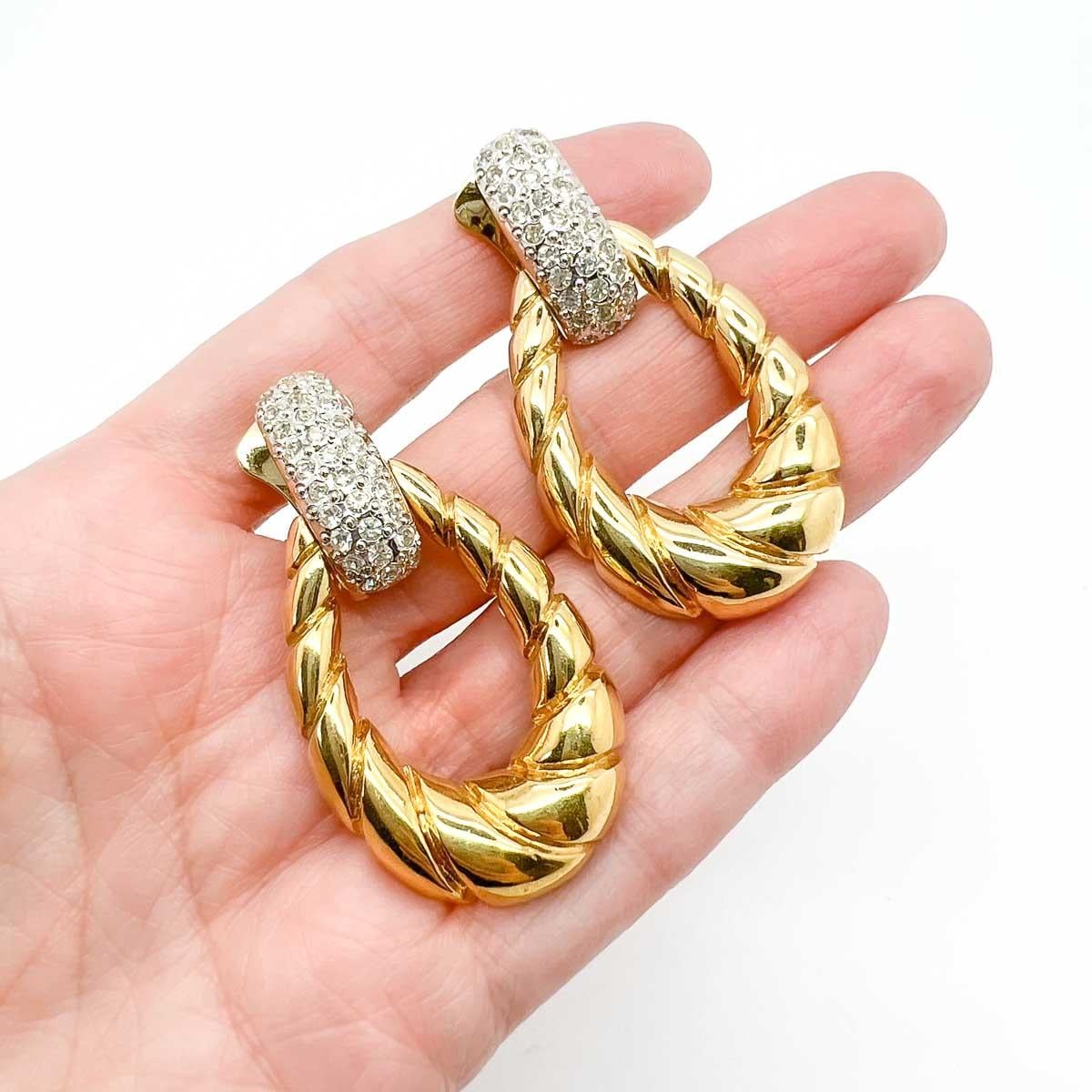Vintage Doorknocker Earrings. An unsigned beauty. A rare treasure. Just because a jewel doesn’t carry a designer name, doesn’t mean it isn't coveted. The unsigned beauties in our collection are sourced specifically by Jennifer for their standout