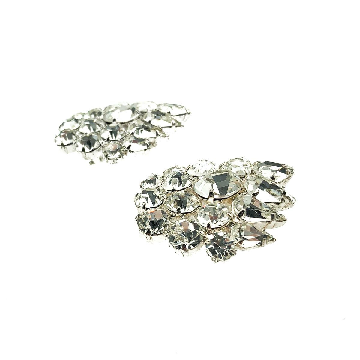 Adorable Vintage Crystal Cluster Earrings from the 1980s. Crafted in silver tone metal and set with a glorious myriad of fancy cut glass crystals of exceptional size and quality including teardrop, round and oval. In very good vintage condition,