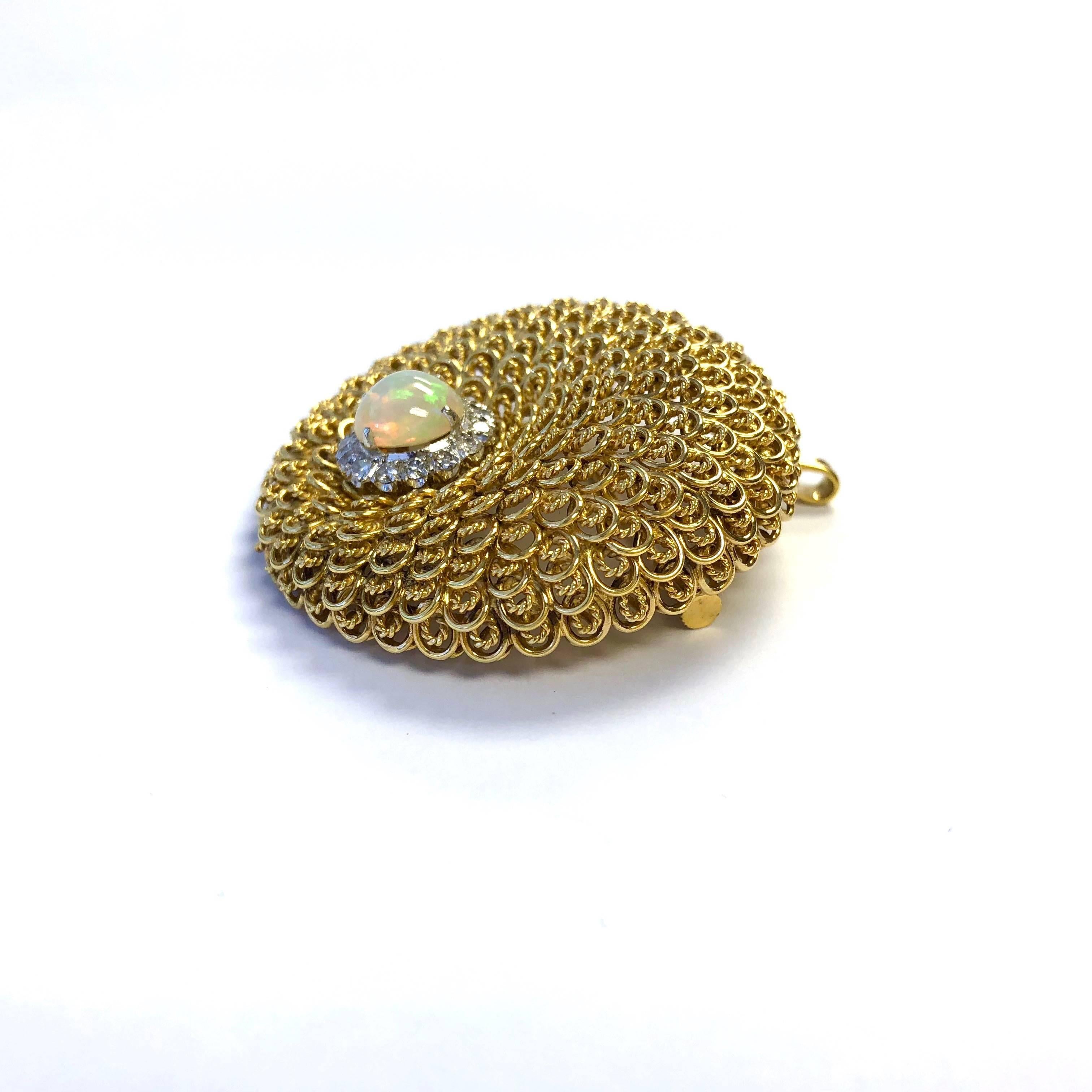 Gorgeous 14K yellow gold pin pendant, featuring a round cabochon crystal opal set within a bezel of diamonds and a large gold 