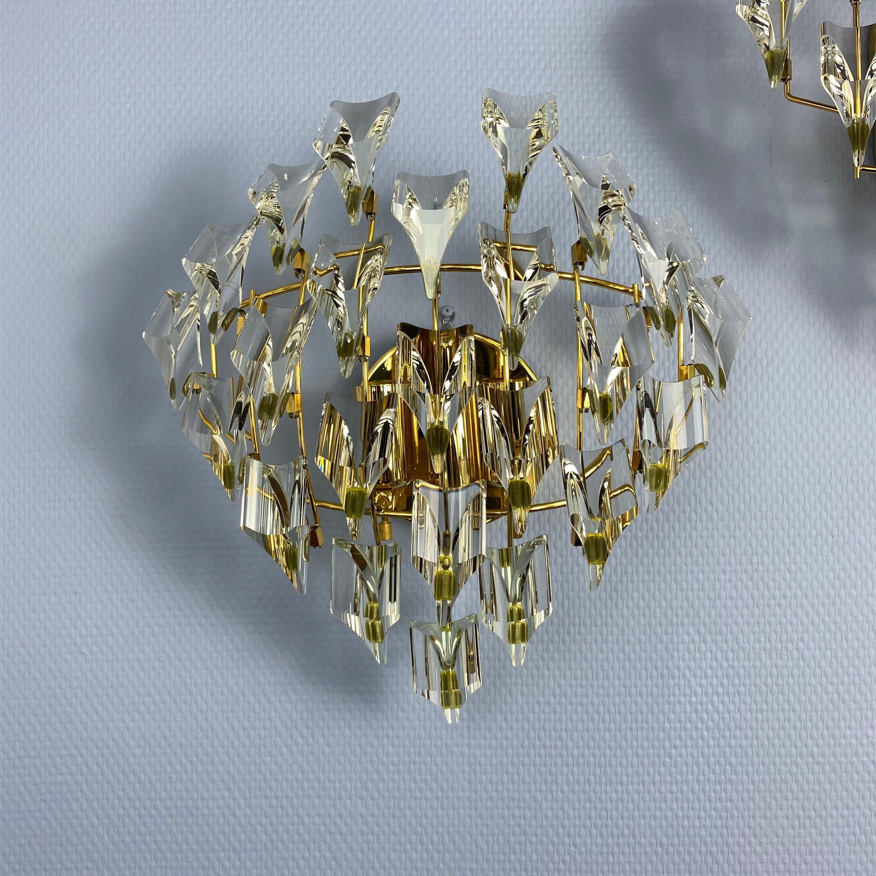 Crystal vintage wall sconces Christoph Palme.

Germany

Christoph Palme is one of the best light manufacturers in Europe!

Gilded brass.

High quality crystal!

Vintage.

1970s.

Size:

Height 13.8 inc (35 cm).

Width 11.8 inc (30 cm).

For three