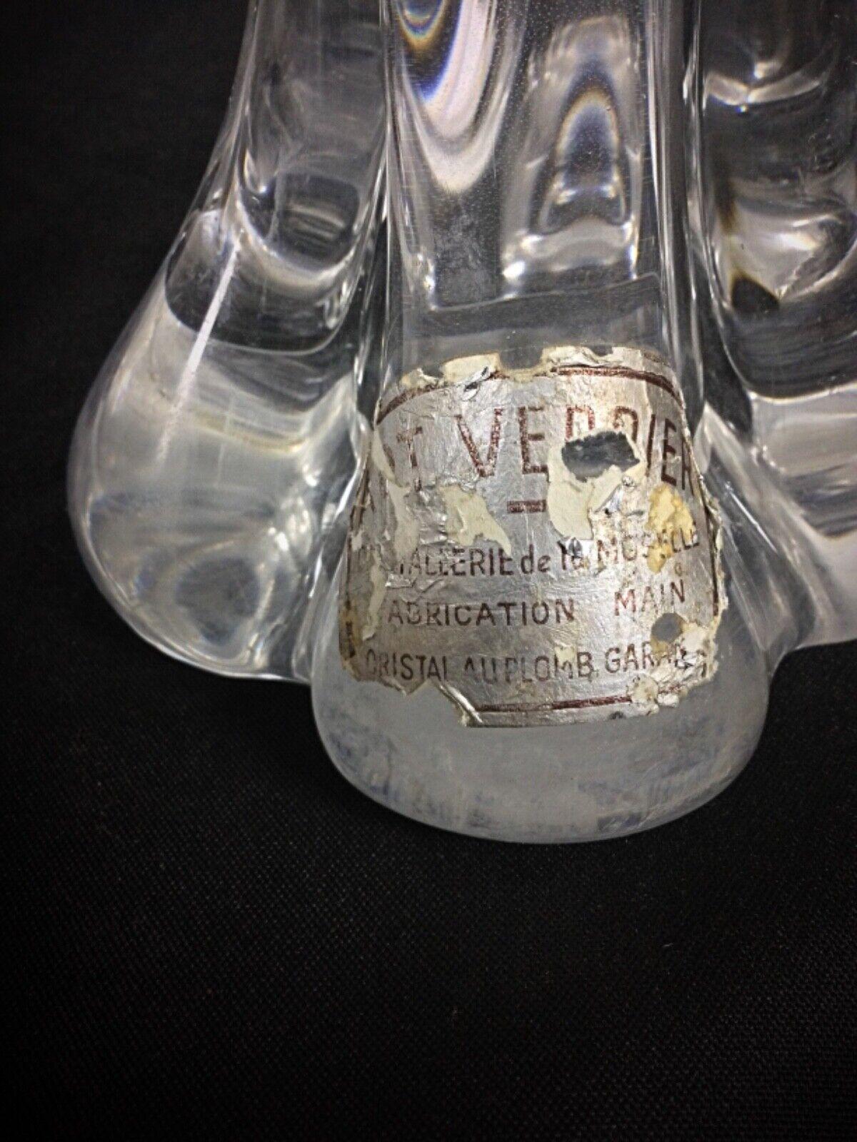 This exquisite vintage sculpture from Art Verrier, renowned for their craftsmanship in the Moselle region, is a stunning example of fine crystal artistry. Made from guaranteed lead crystal, this piece has an elegant and timeless design that would be