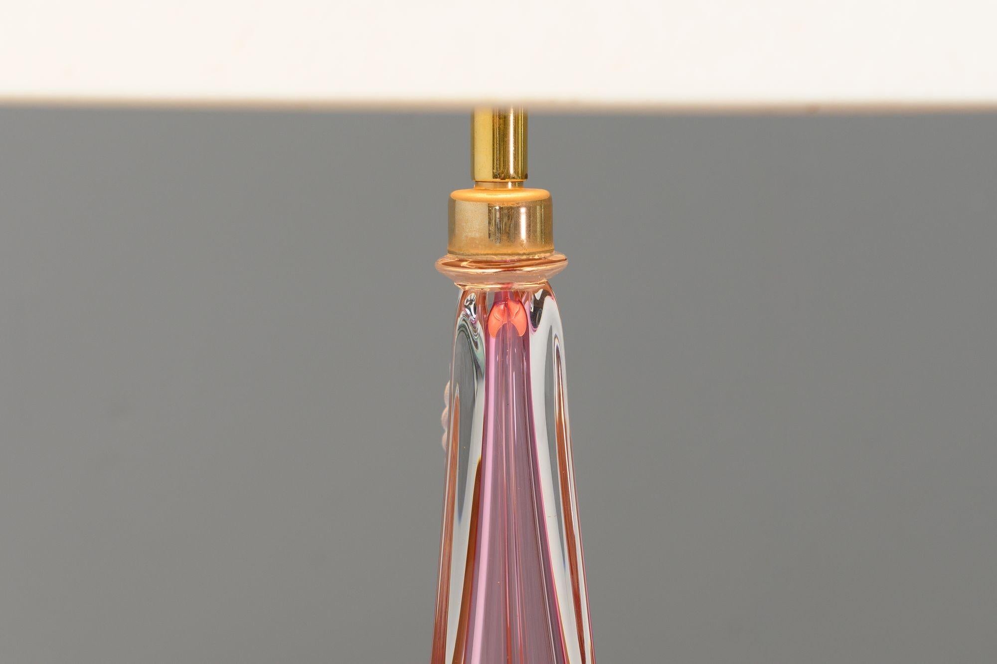 Vintage crystal table lamp in a pale pink colour. Re-wired and tested. France circa 1960. Shade not included.
H 39cm x W 13cm x D 13cm