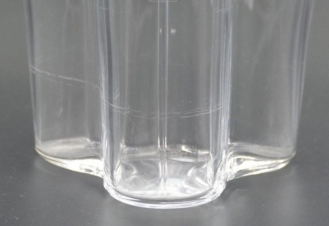 Vintage crystal vase is a decorative crystal object designed by Alvar Aalto and manufactured by Ittala in the 1980s.

Elegant crystal vase in the shape of a corolla.

Corolla vase is characterized by a round design with vertical cuts and a scalloped