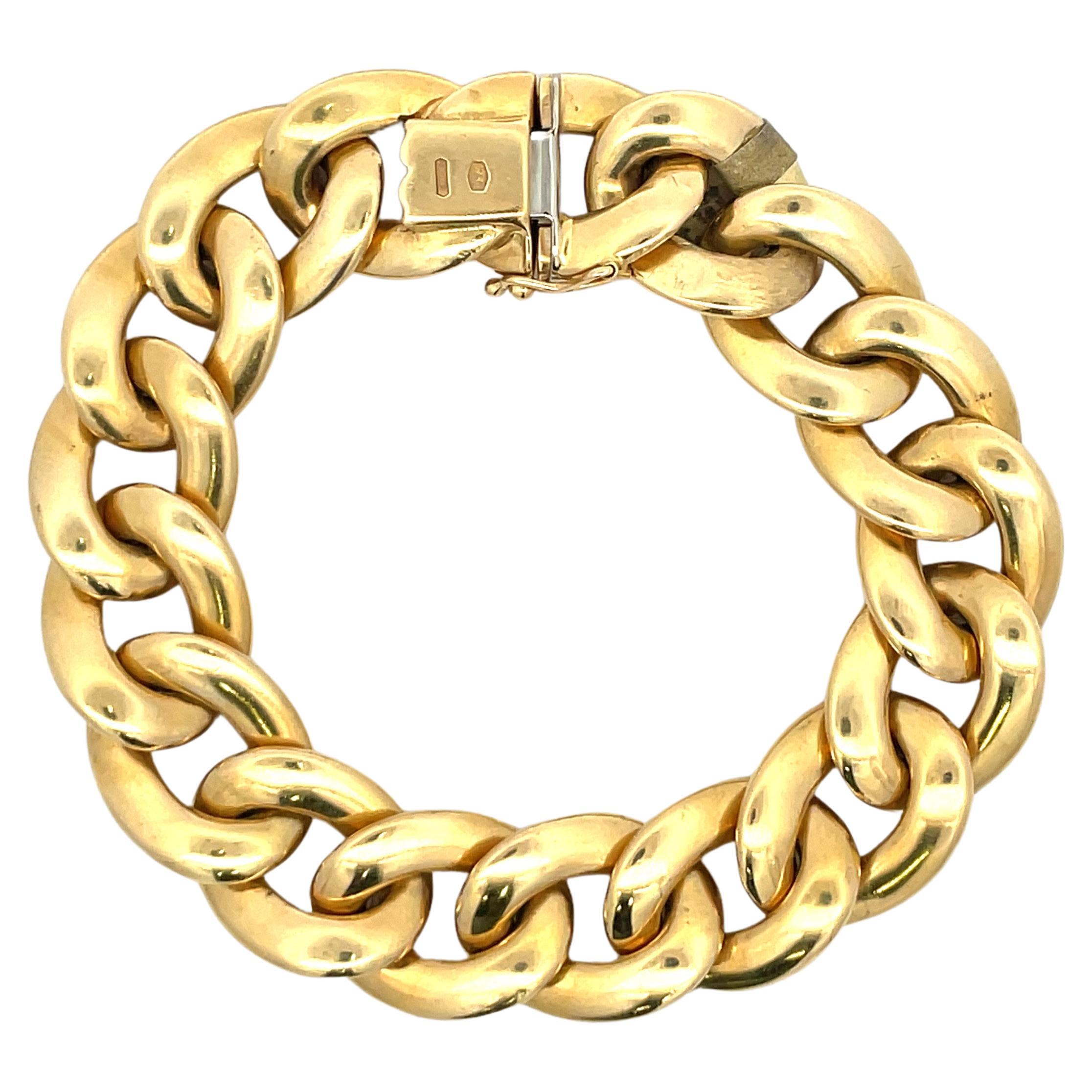 Vintage 18 karat yellow gold link bracelet featuring 17 Cuban links in a brushed finished weighing 41 grams.
Stamped 750 *470 VI

More link bracelets available.
Search Harbor Diamonds