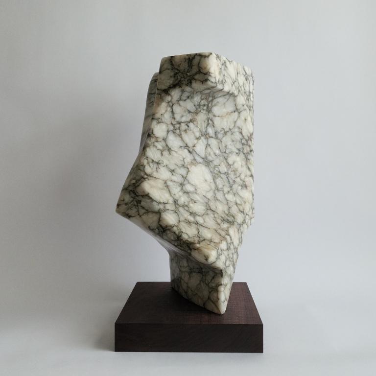 Vintage Cubist Abstract Sculpture
Hand carved Marble
D. Fink, c. 1970s
Black walnut base

Measurements:
15.5