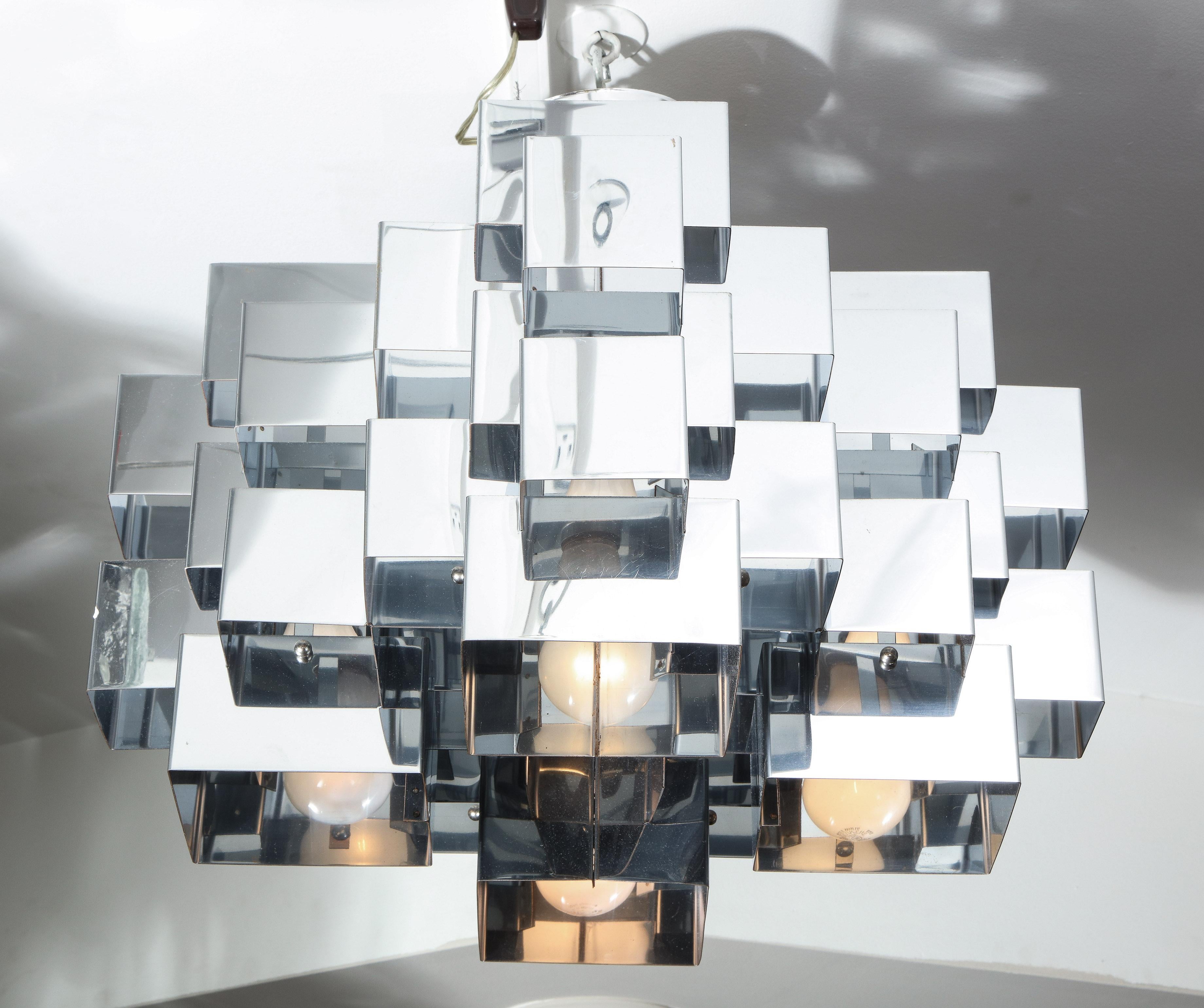 Vintage Cubist chrome chandelier by Curtis Jere. Minor rusting showing on few edges of the metal square shades. Takes 4 lightbulbs.