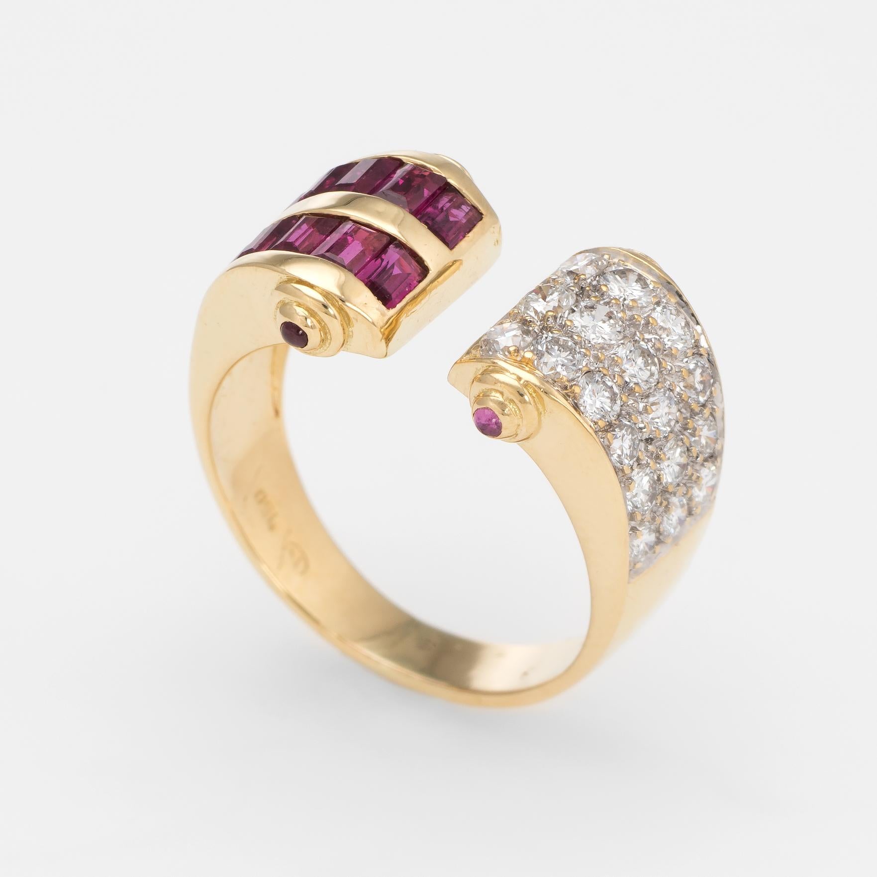 Elegant vintage cuff ring (circa 1980s), crafted in 18 karat yellow gold. 

Round brilliant cut diamonds are pave set into the mount and total an estimated 0.50 carats (estimated at G-H color and VS2 clarity). The straight baguette cut rubies