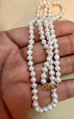 Vintage Cultured Akoya Pearl Halskette Länge 17" , 14 Karat Gelbgold Verschluss
