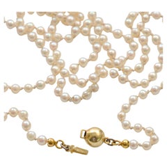Halskette aus 14 Karat Gold mit Zuchtperlen und Diamanten