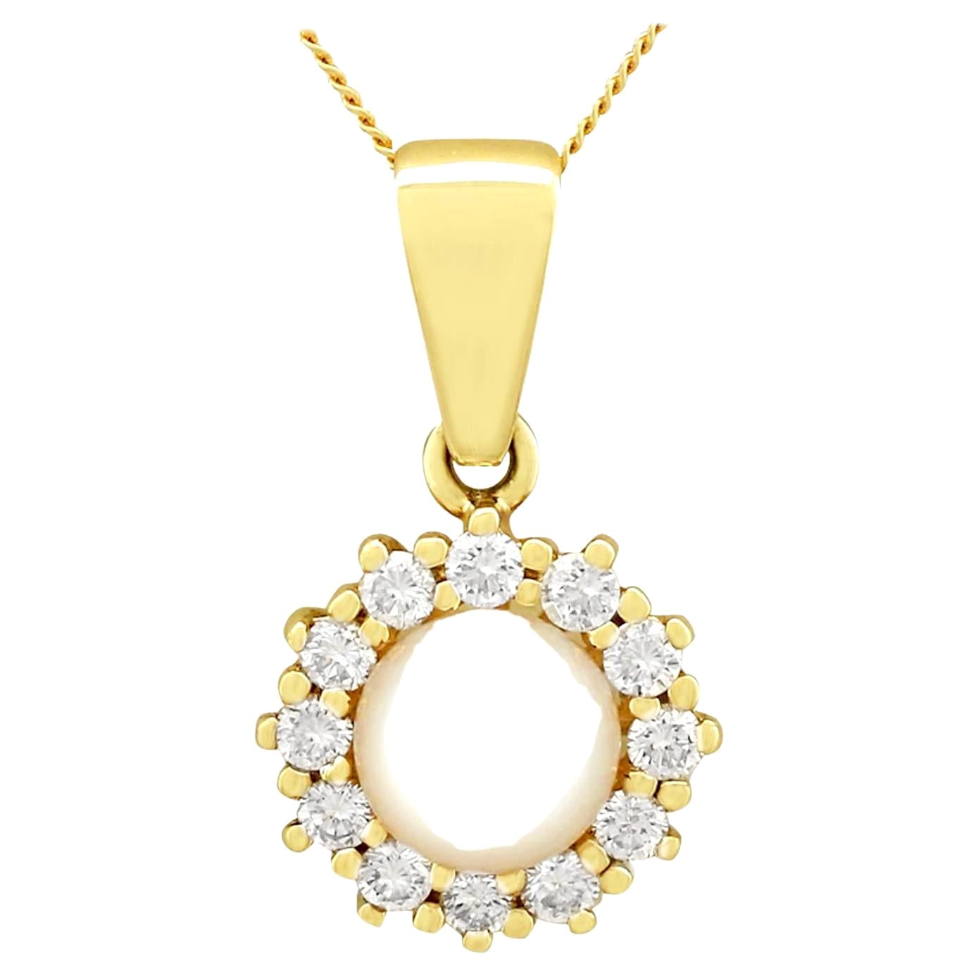 Ciondolo vintage in oro giallo con perle coltivate e diamanti