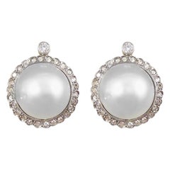 Vintage Cultured Pearl Diamond Halo Omega Clip Earrings in 18 Carat White Gold