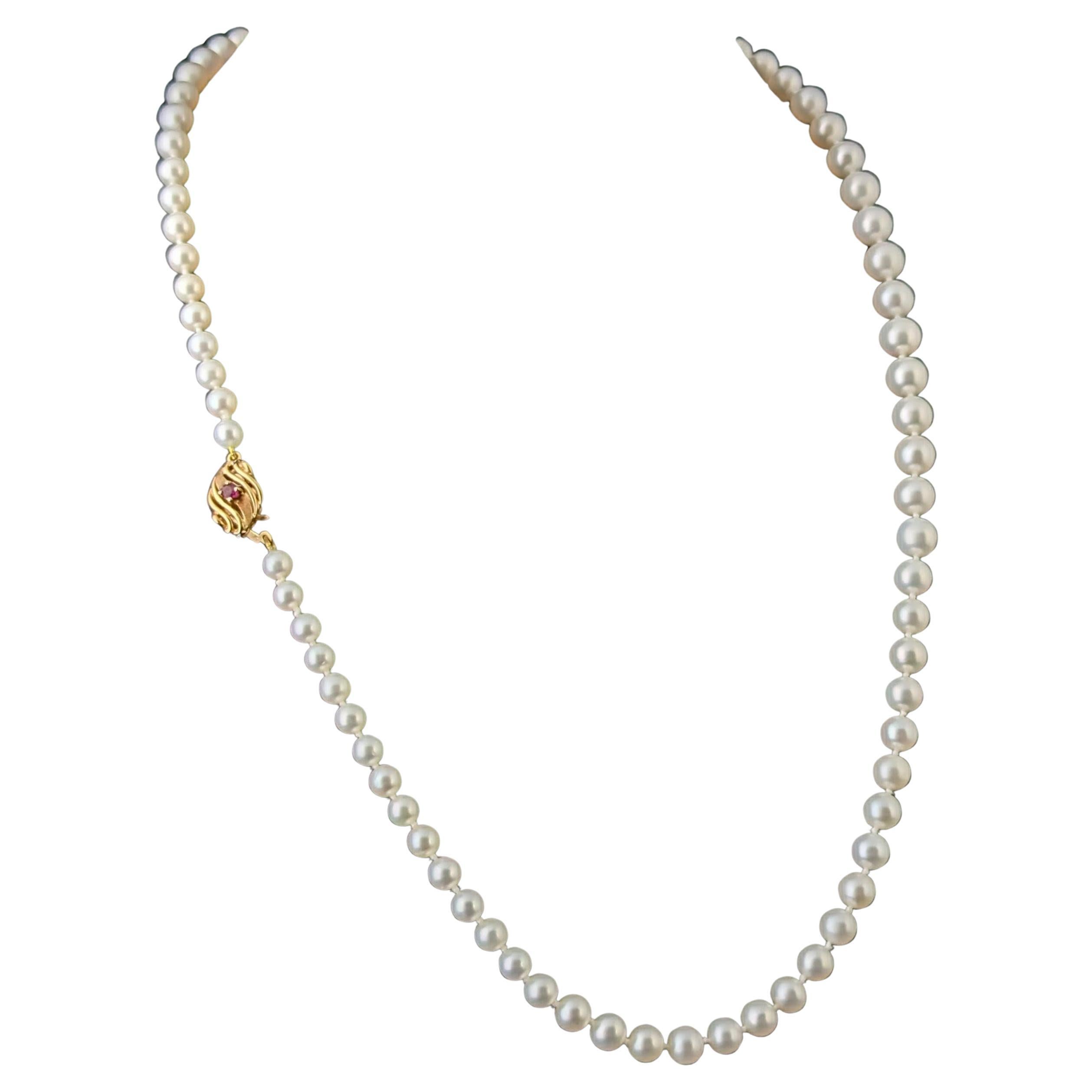 Collier vintage en perles de culture, or 9k et fermoir en rubis
