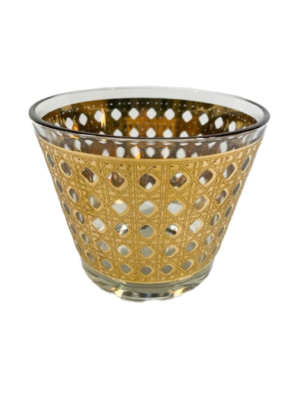 Mid-Century Modern glass ice bowl by Culver, LTD., in a 22 karat gold having smooth and raised textured finishes designed to imitate woven cane.