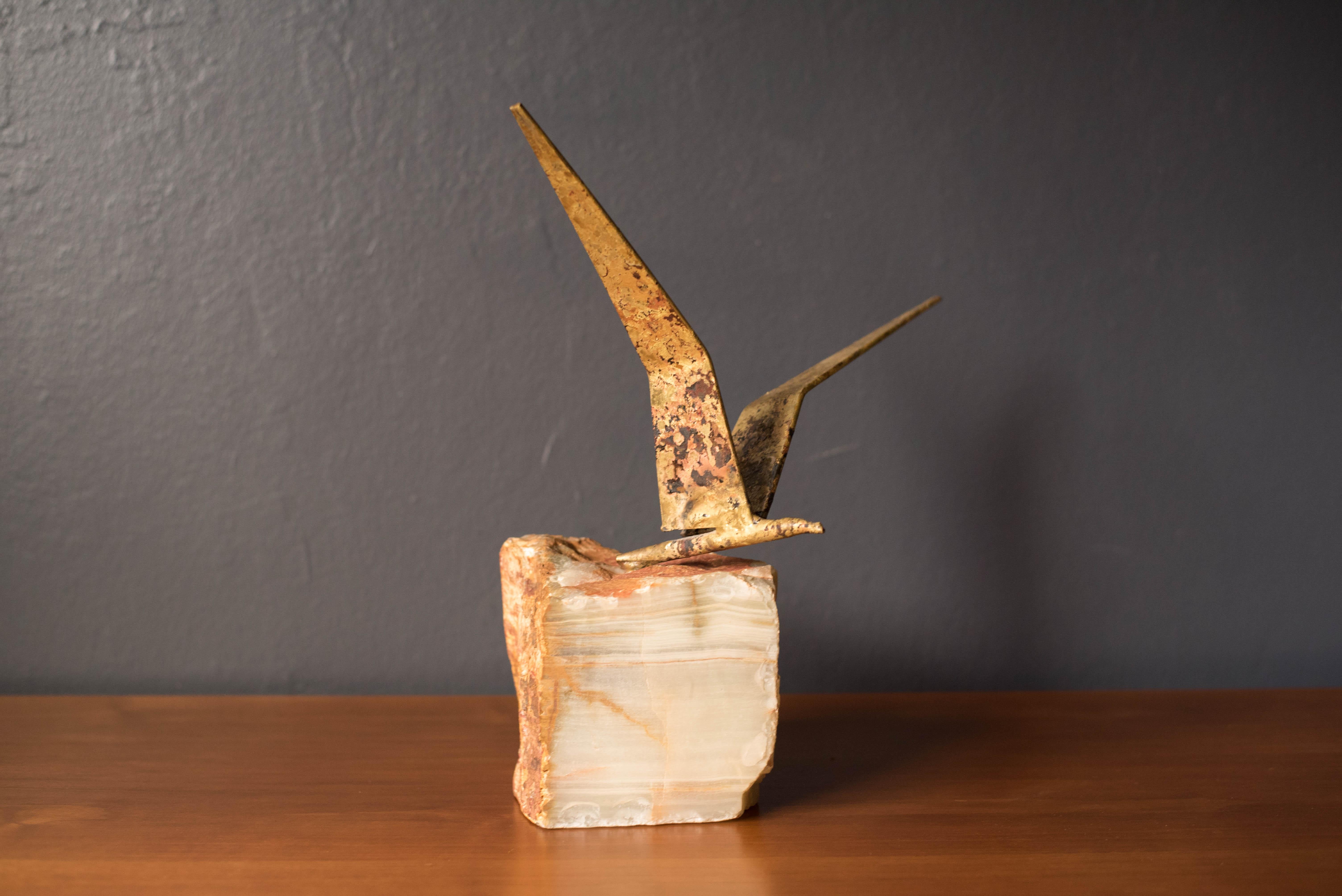 Midcentury abstract bird in flight sculpture signed C. Jere '69 for Artisan House. This piece is made of mixed metals with beautifully aged patina and is mounted on a heavy striated stone base.
