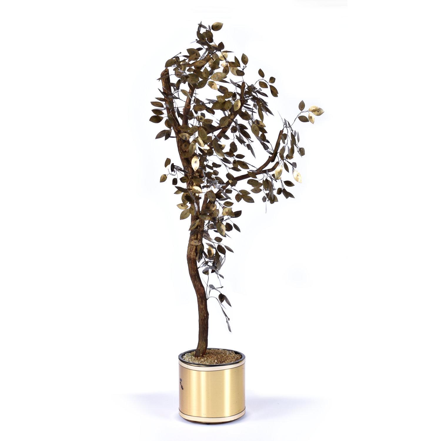 Fabulous vintage 1970s Curtis Jere style patinated brass decorative potted tree. The elegantly welded metal tree is quite large. The tree with pot reaches to 73? in height and nearly four feet wide! The tree is fixed in the accompanying gold