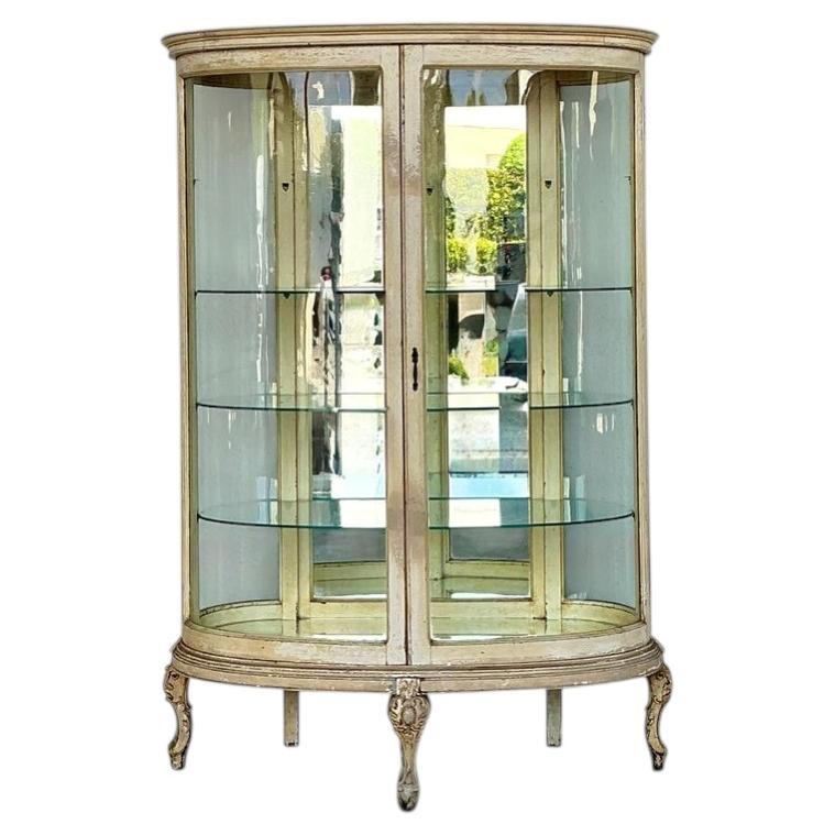 Vitrina vintage de cristal curvado en venta