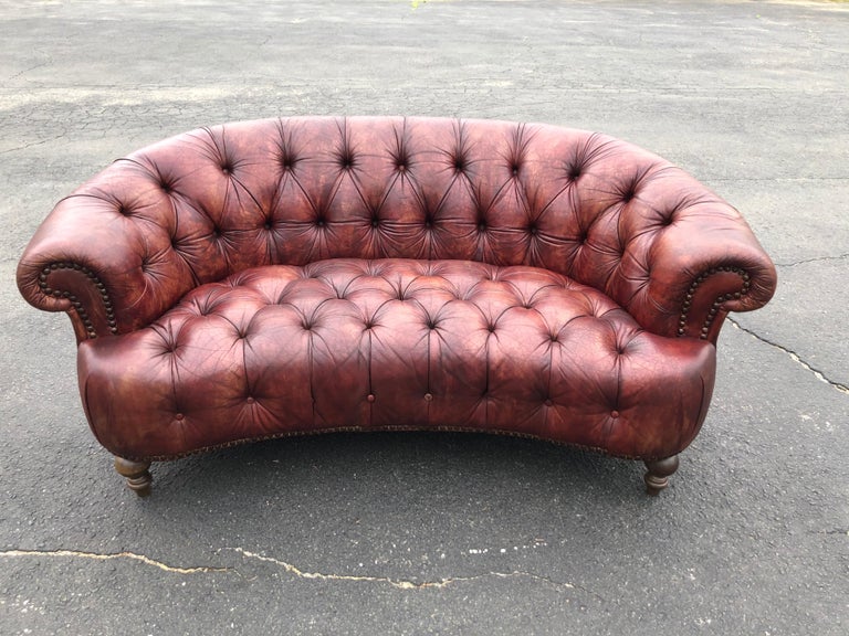 Curved Italian leather Chesterfield Sofa in brown. Classic design and great vintage condition. Perfect for that Ralph Lauren Barn style decor or classic Library or Man Cave. Variations in color and finish due to vintage age, use and wear. All