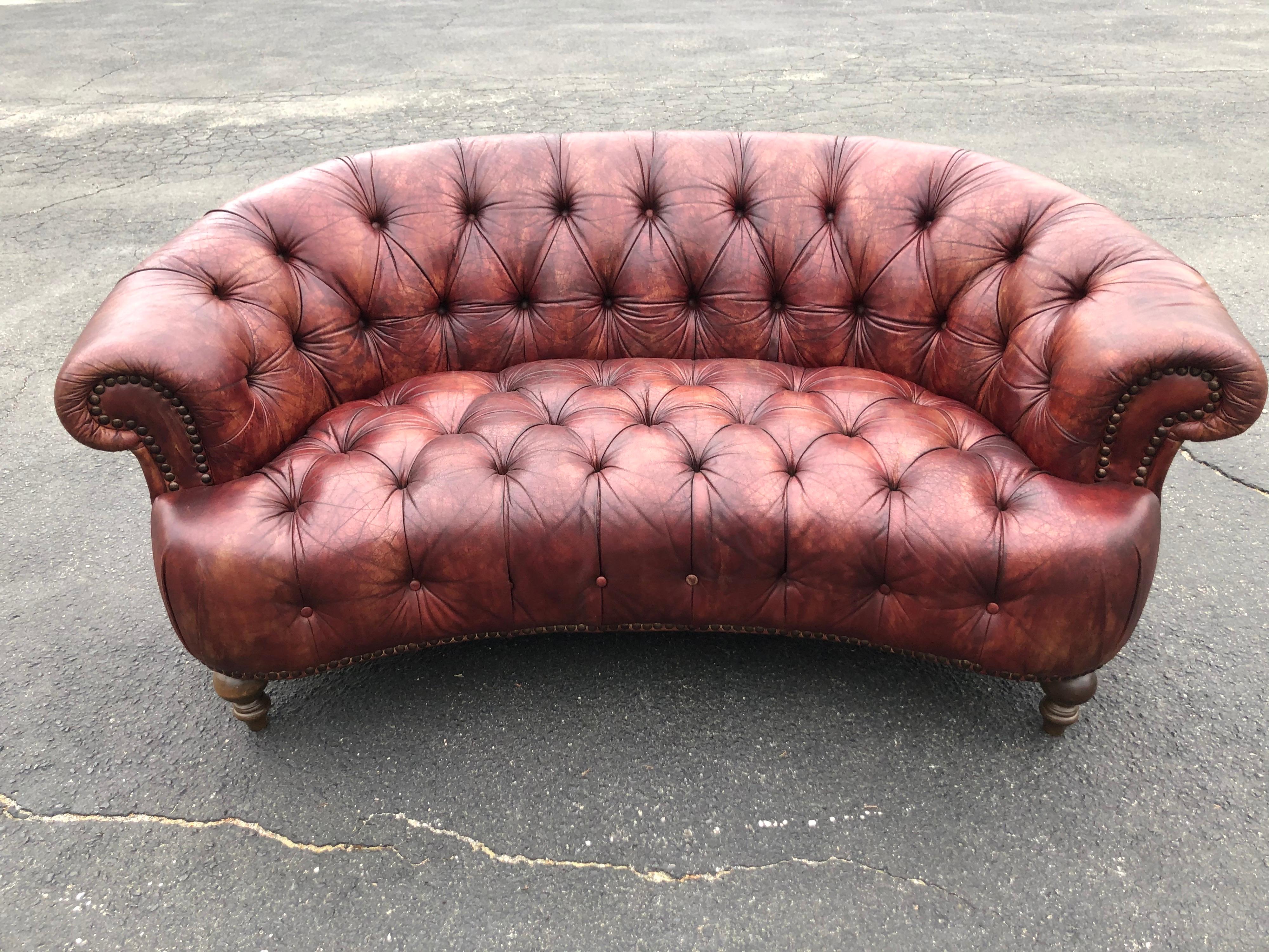 curved leather loveseat