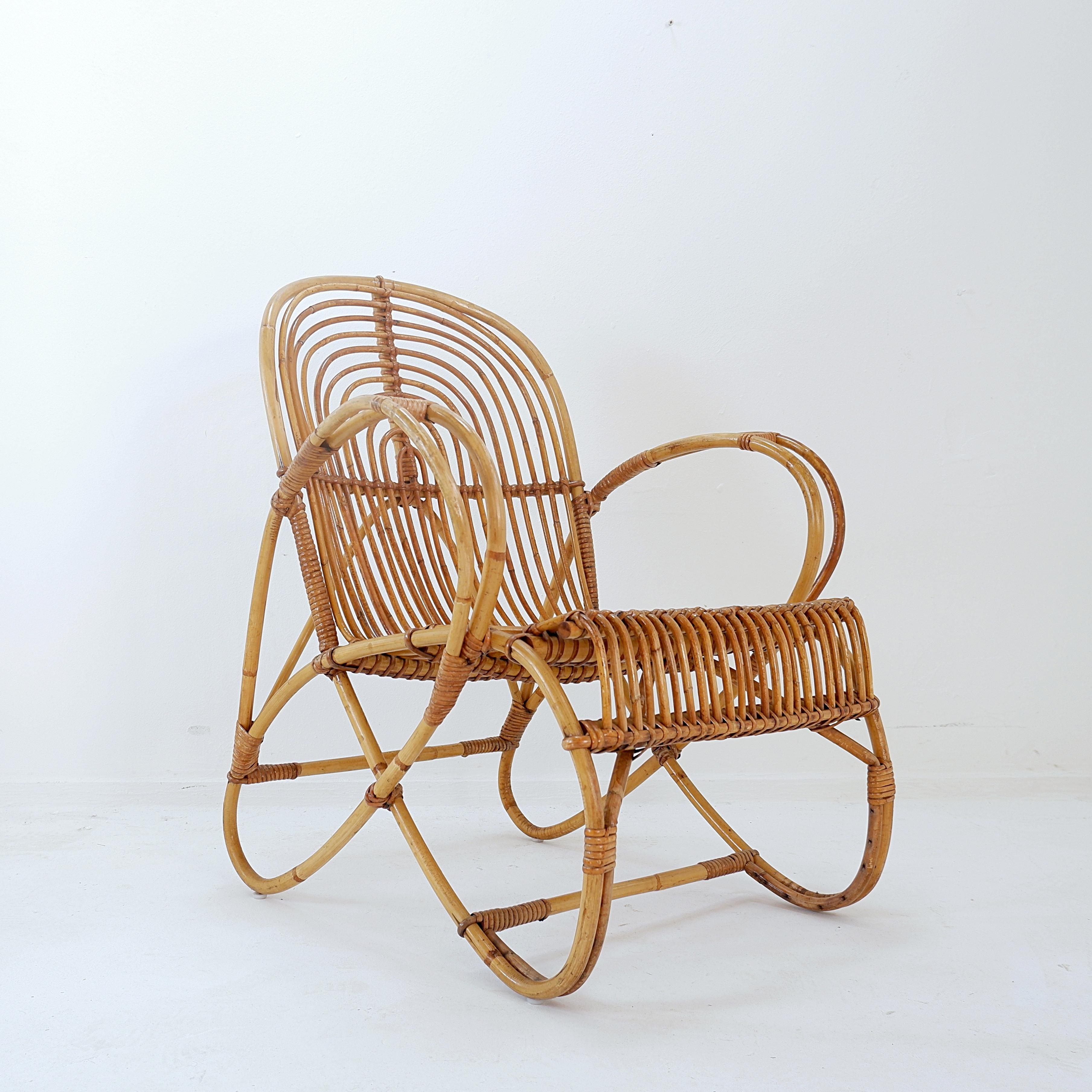 Vintage Sillón curvo de ratán y bambú - Años 60
Estilo Dirk Van Sliedregt - Interior / Exterior
Medidas : 66x70cm H:84 cm SH: 40cm
Desgaste propio de la edad y el uso.