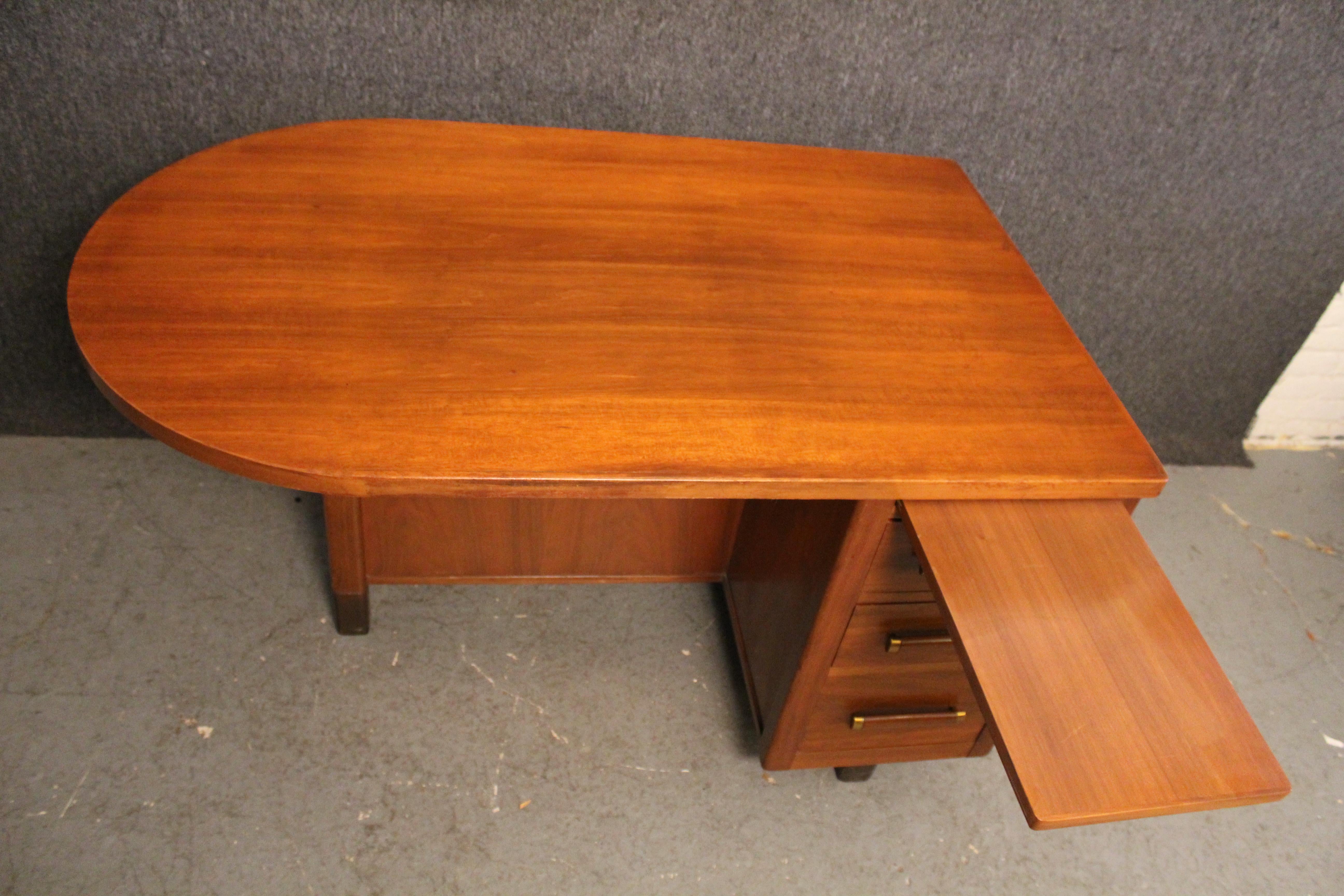 curved walnut desk