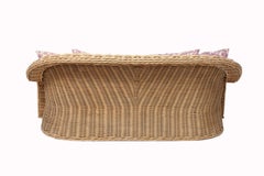 Vintage Curved Wicker Sofa Upholstered in Pink and Purple Floral Fabric